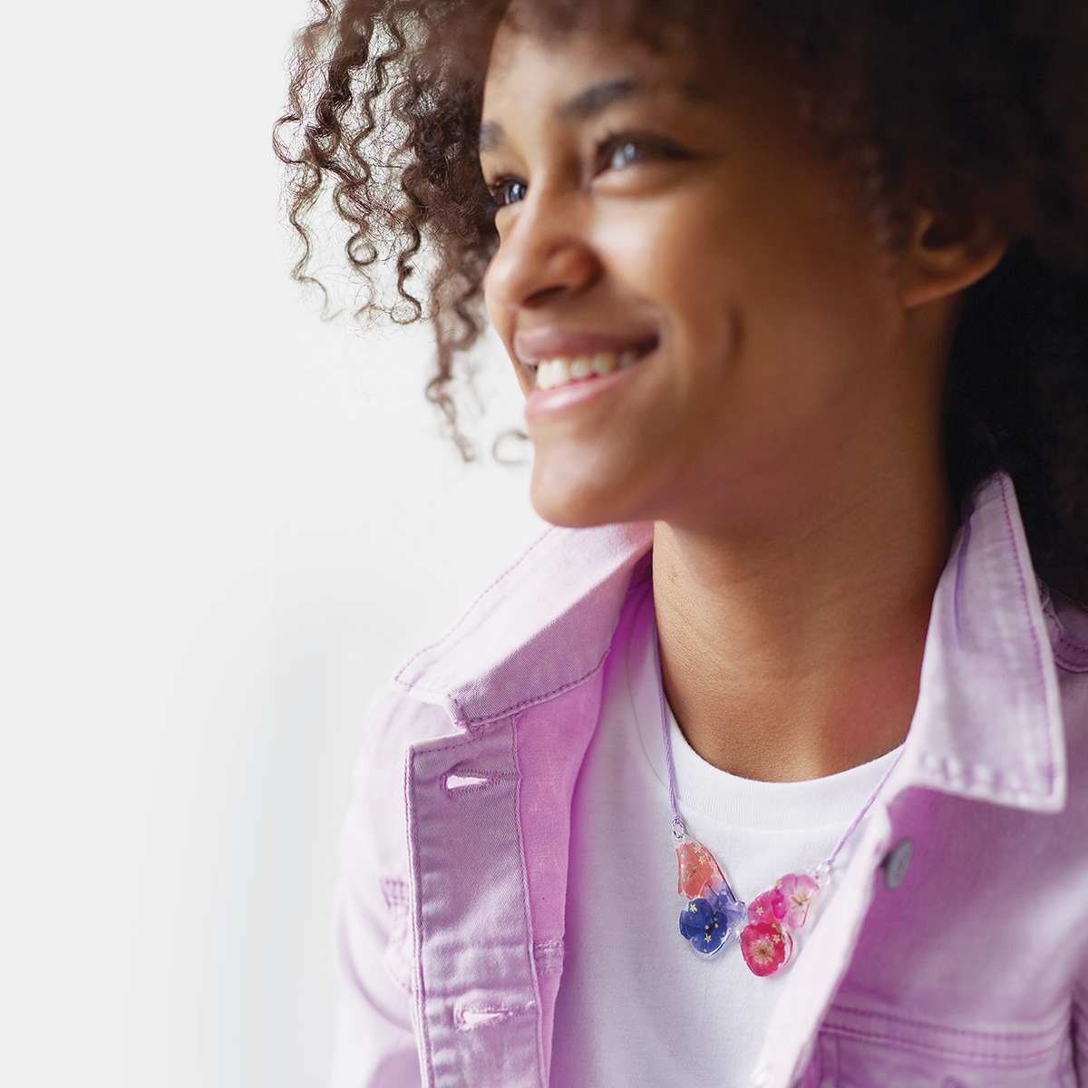 Make Your Own Glaze Craze Charms Kit - Model wearing finished Butterfly Charm

