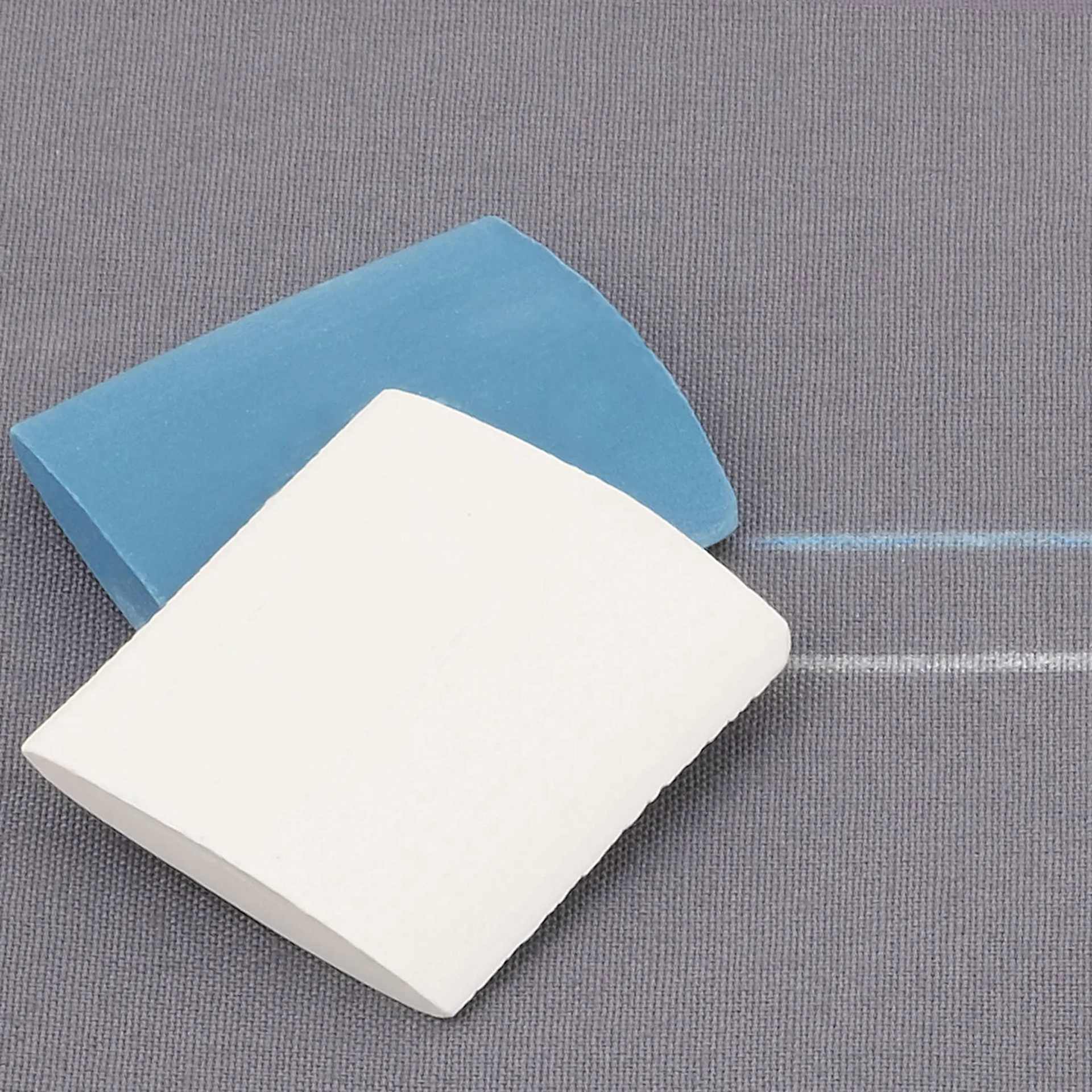 Dritz Tailor's Chalk white and blue pieces on fabric