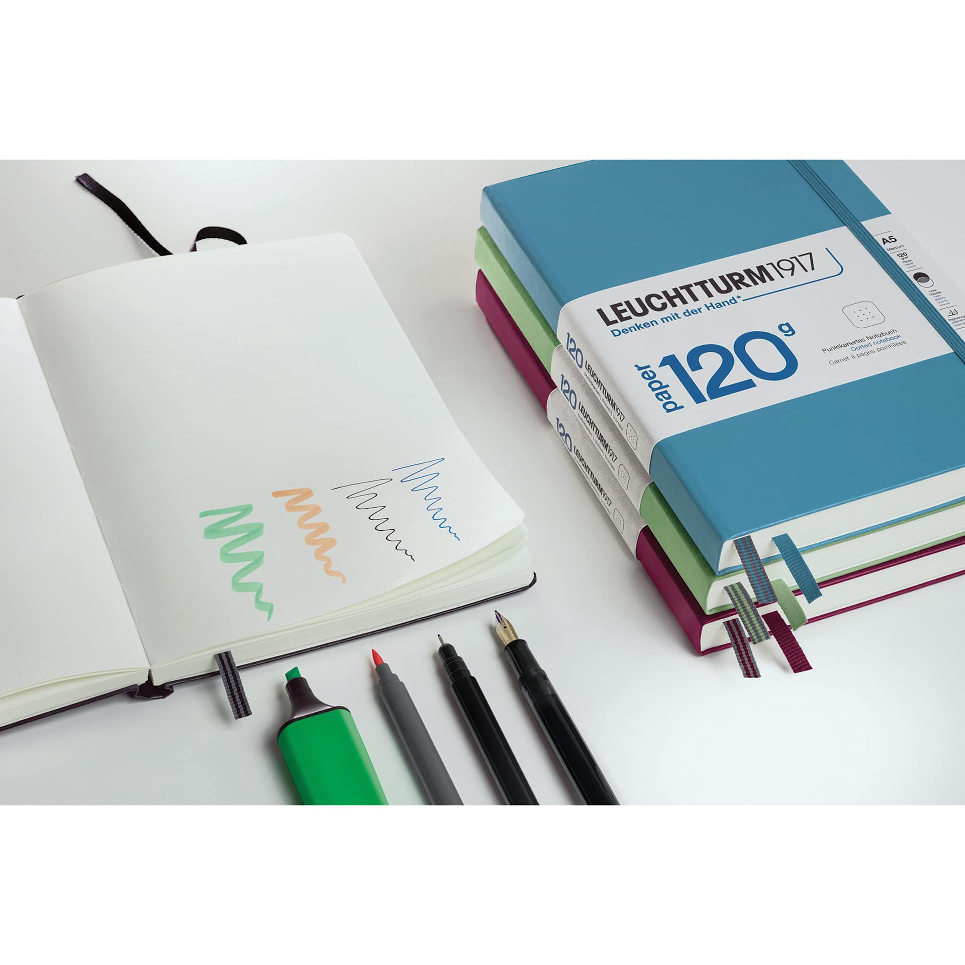 Leuchtturm1917 Edition 120G Notebooks (open with marker swatches, multiple colors stacked beside it)