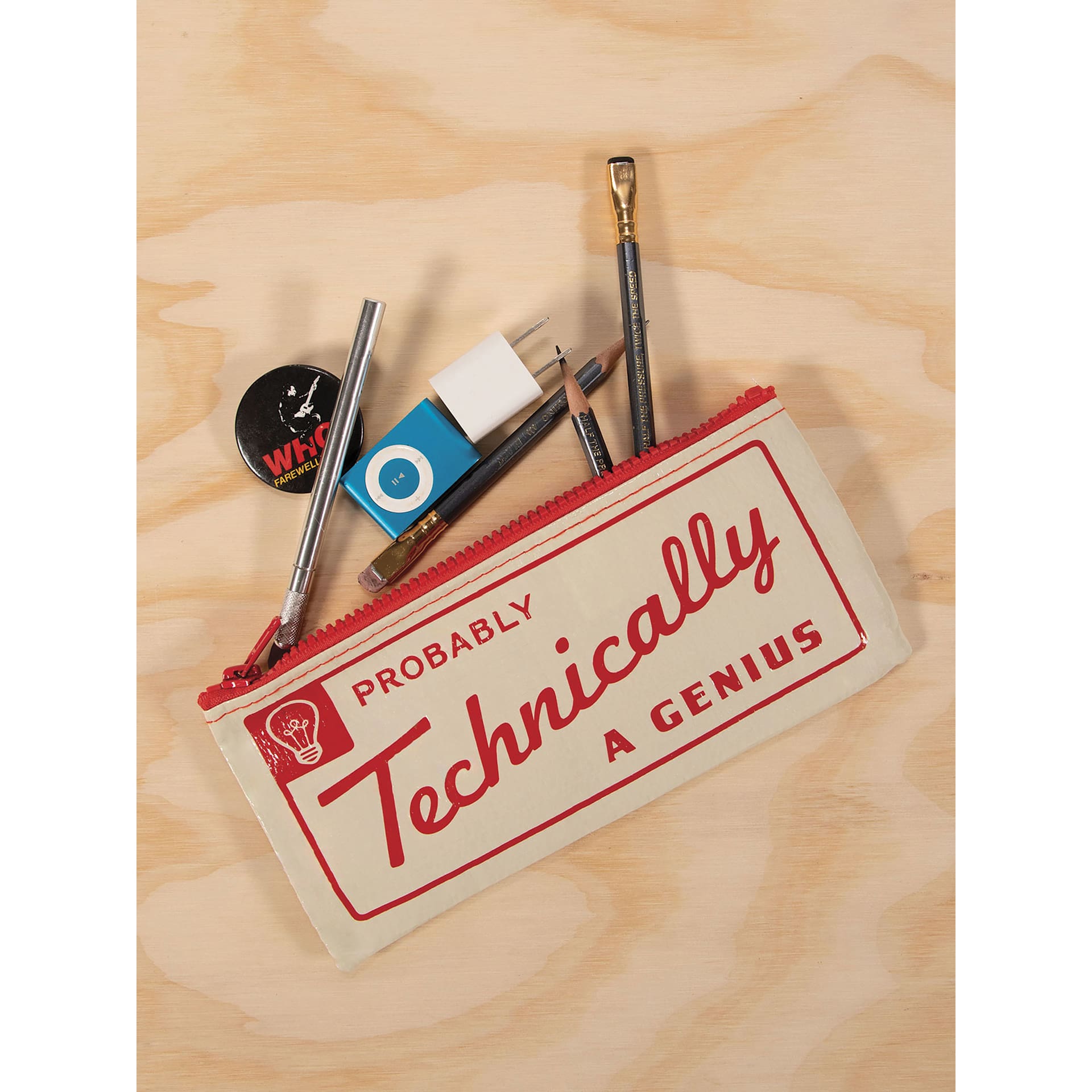 Blue Q Zipper Pencil Pouch - Probably Technically a Genius, 8-1/2" x 4-1/4", on table with art materials (not included)