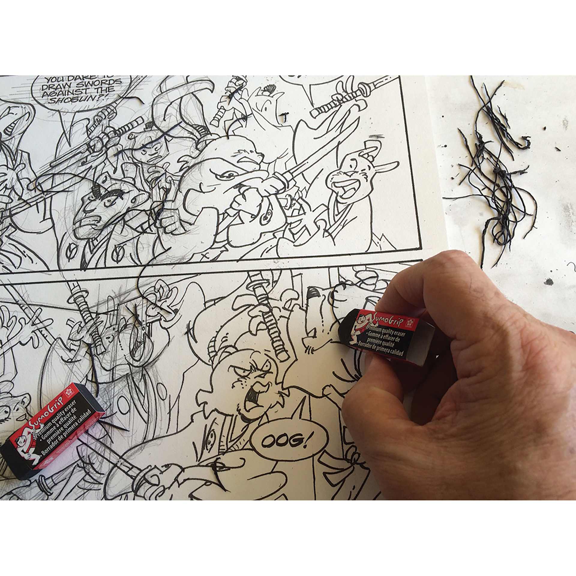 Sakura SumoGrip Eraser, erasing a manga panel