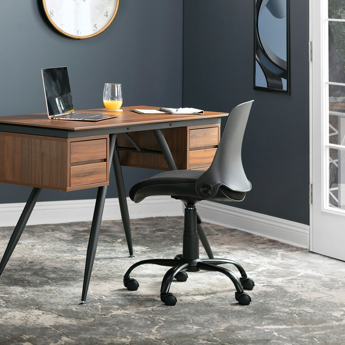 Studio Designs Folding Back Modern Swivel Office Task Chair - Black chair shown at desk
