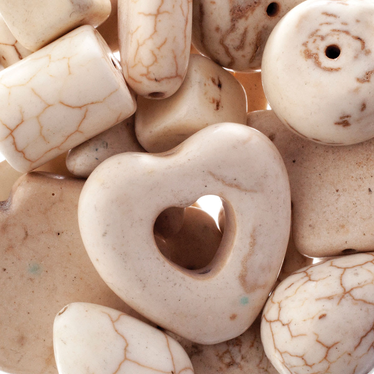 John Bead Earth's Jewels - Closeup of assorted White Magnesite Beads