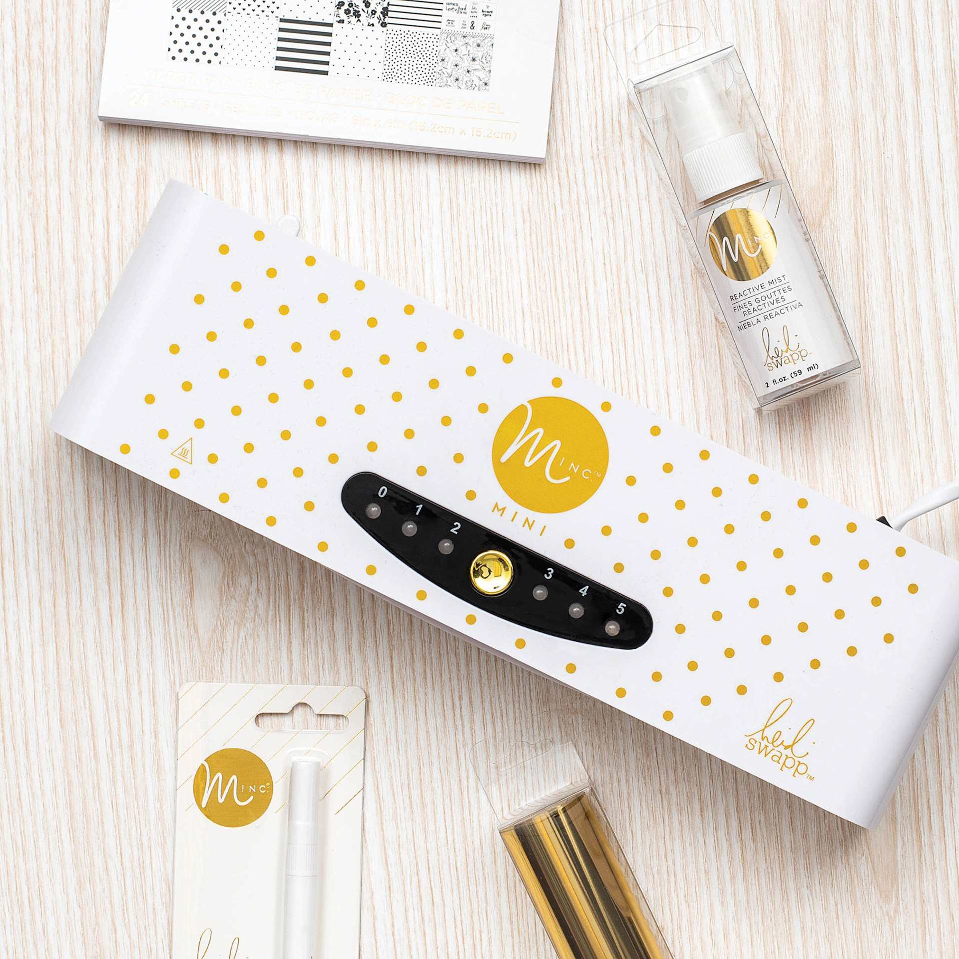 Heidi Swapp Mini Minc Foil Applicator and Starter Kit - 6", machine and contents laid out
