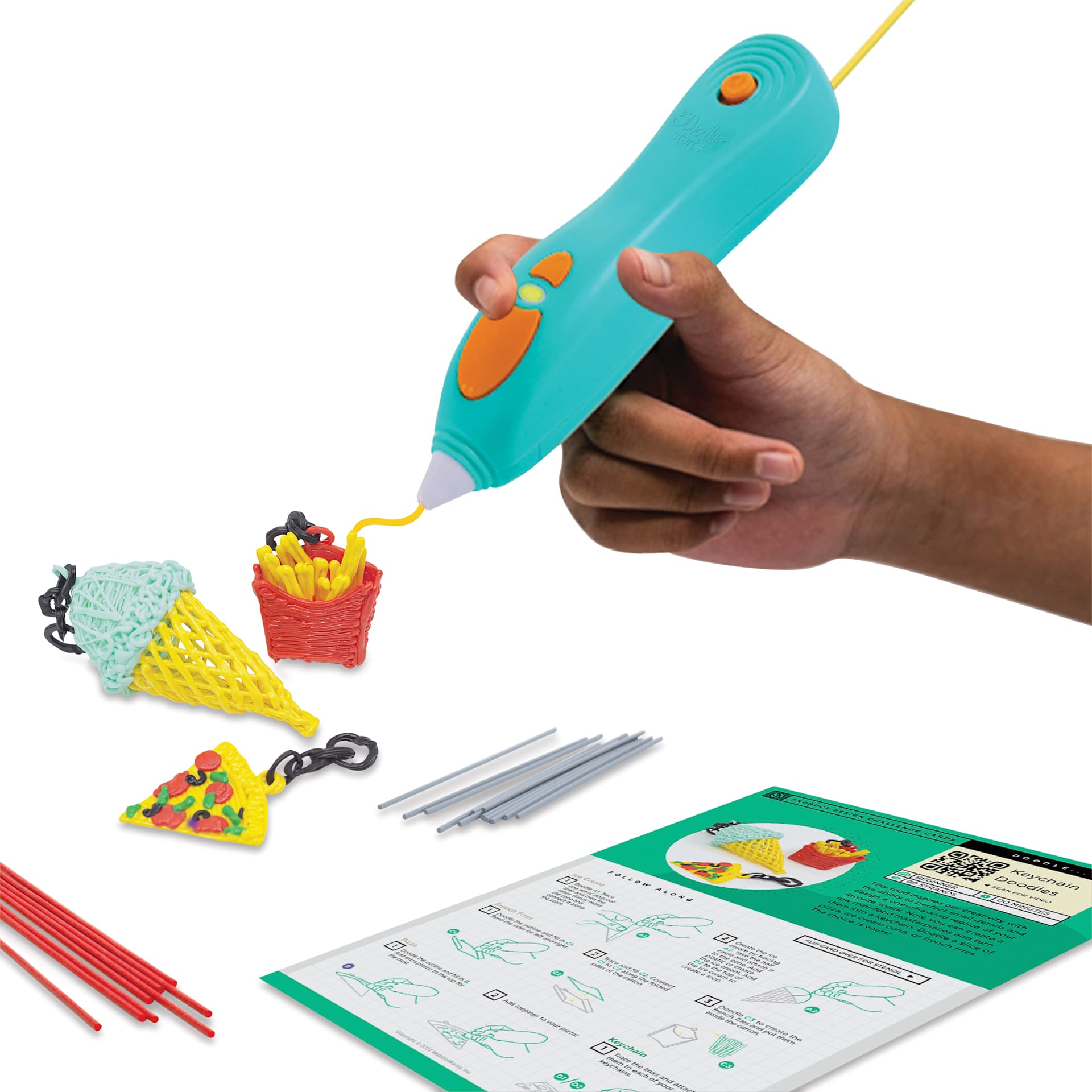 3Doodler Start+ Accessory Kit, person using the 3Doodler and accessory kit (Doodler pen not included)
