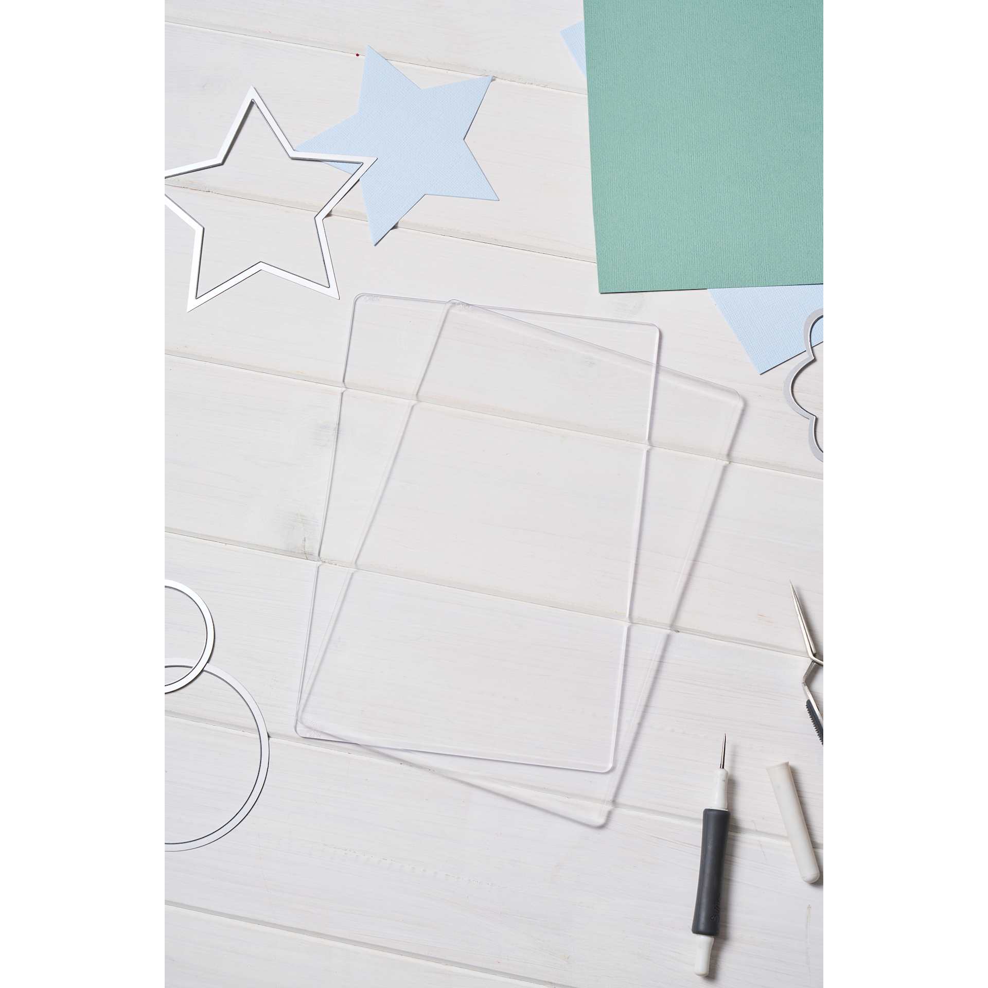 Sizzix Cutting Pads - Accessory A5, 6-1/8" x 10-1/4" x 1/8" stacked on table (only single cutting board included)