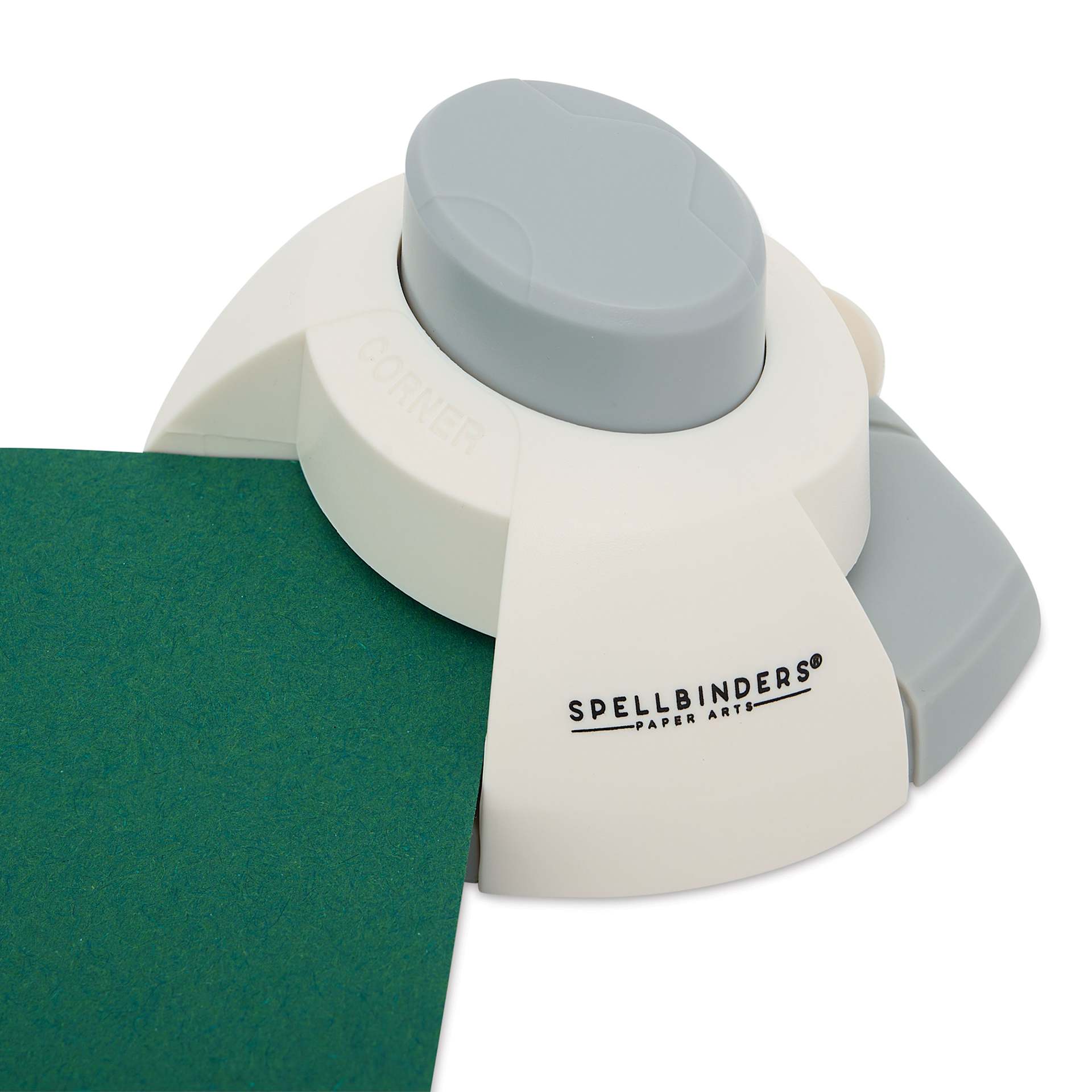 Spellbinders 1-2 Punch Corner Rounder and Notch punching rounder into paper
