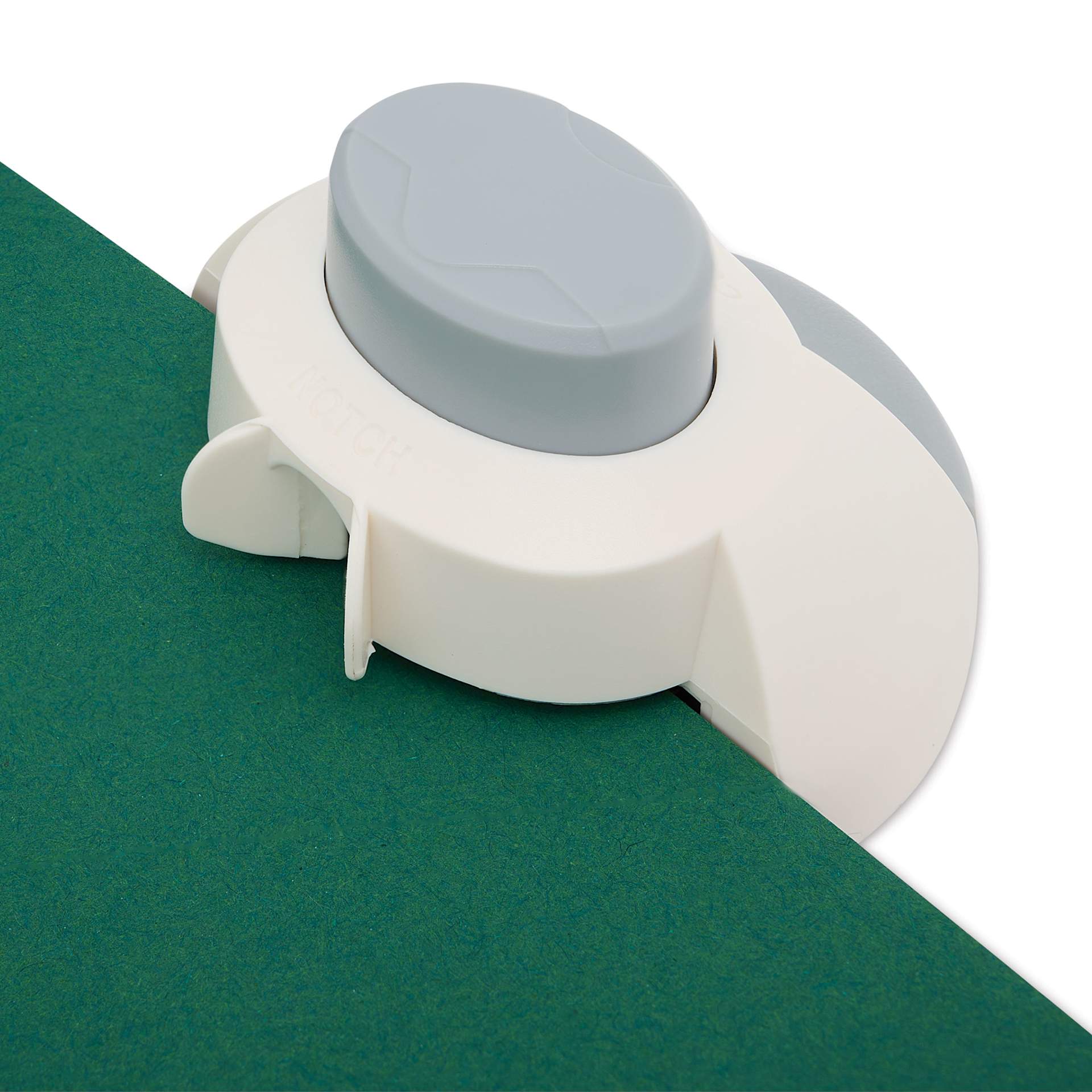 Spellbinders 1-2 Punch Corner Rounder and Notch punching notch into paper