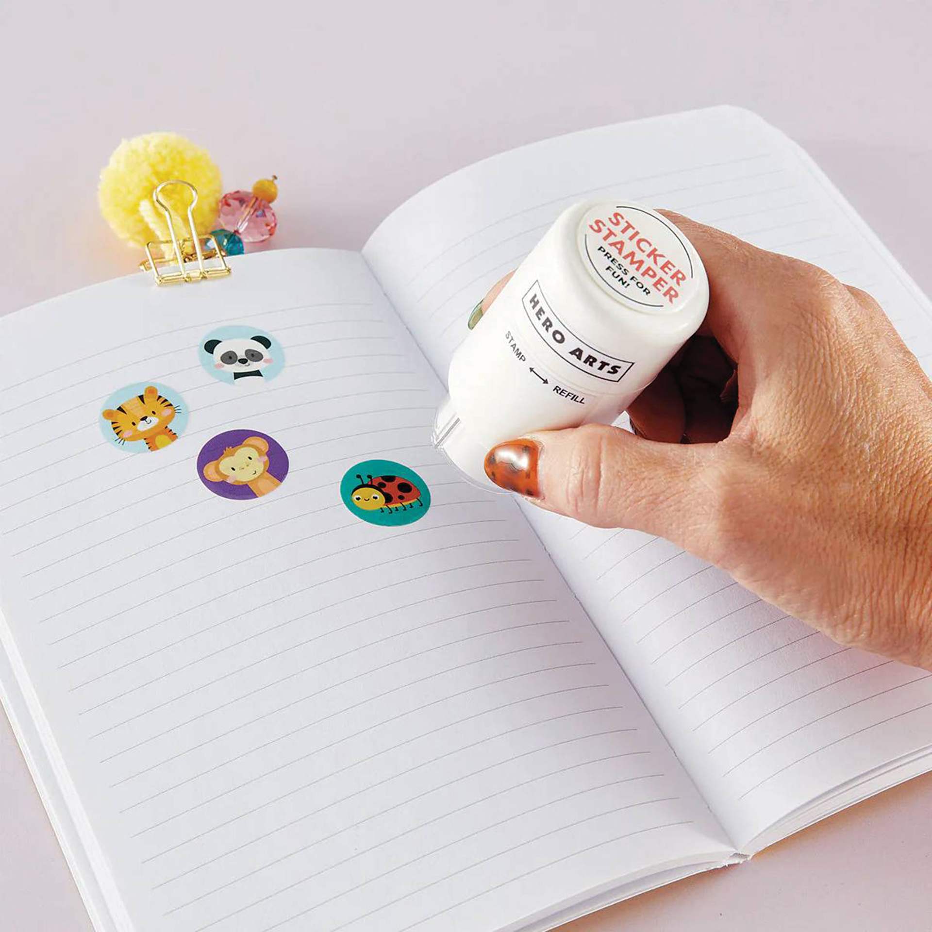 Hero Arts Sticker Stamper Starter Pack - Pkg of 100 Stickers, The Zoo stickers being applied to notebook page