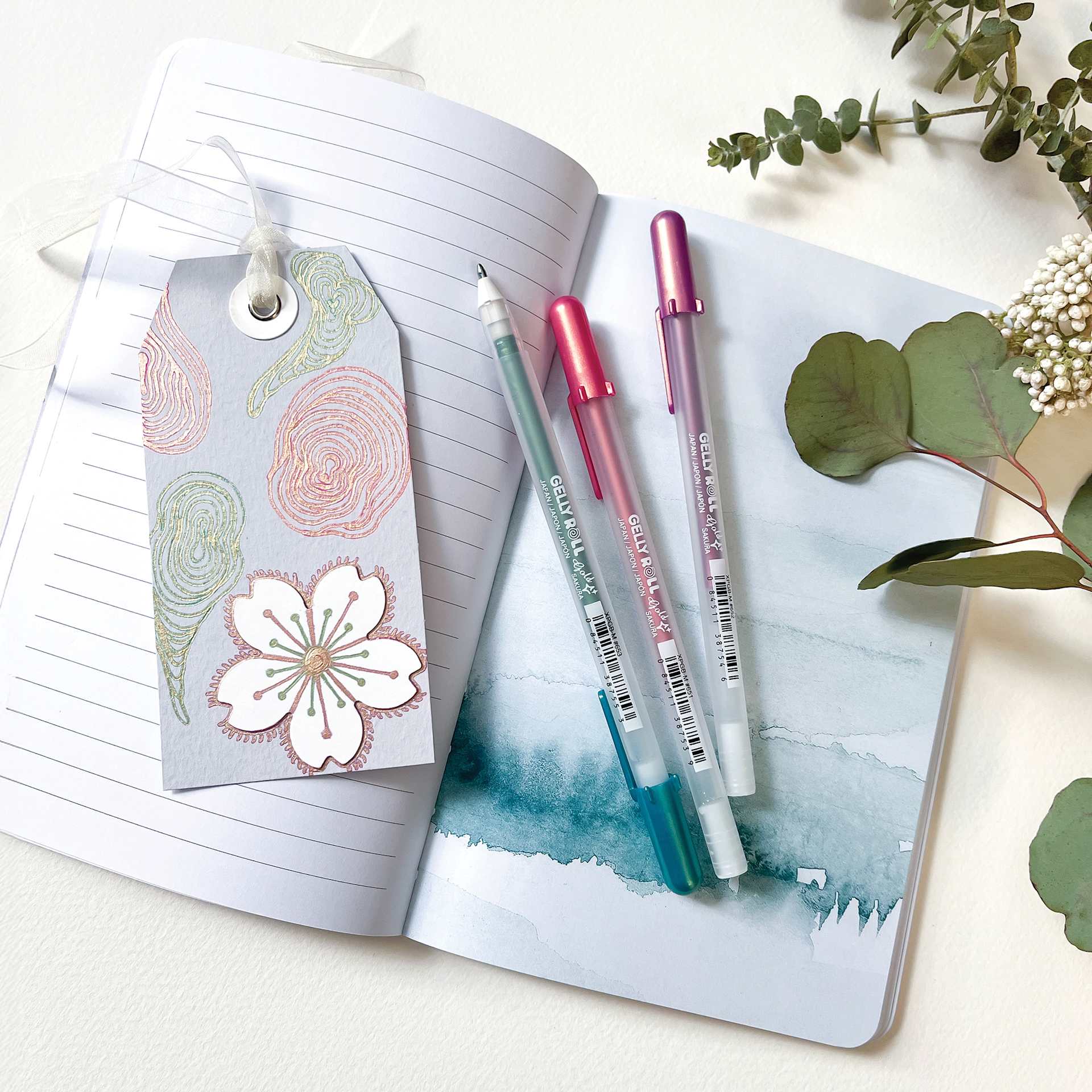 Sakura Gelly Roll Moods Collection Pens - Mindful, Set of 3, with journal on desk