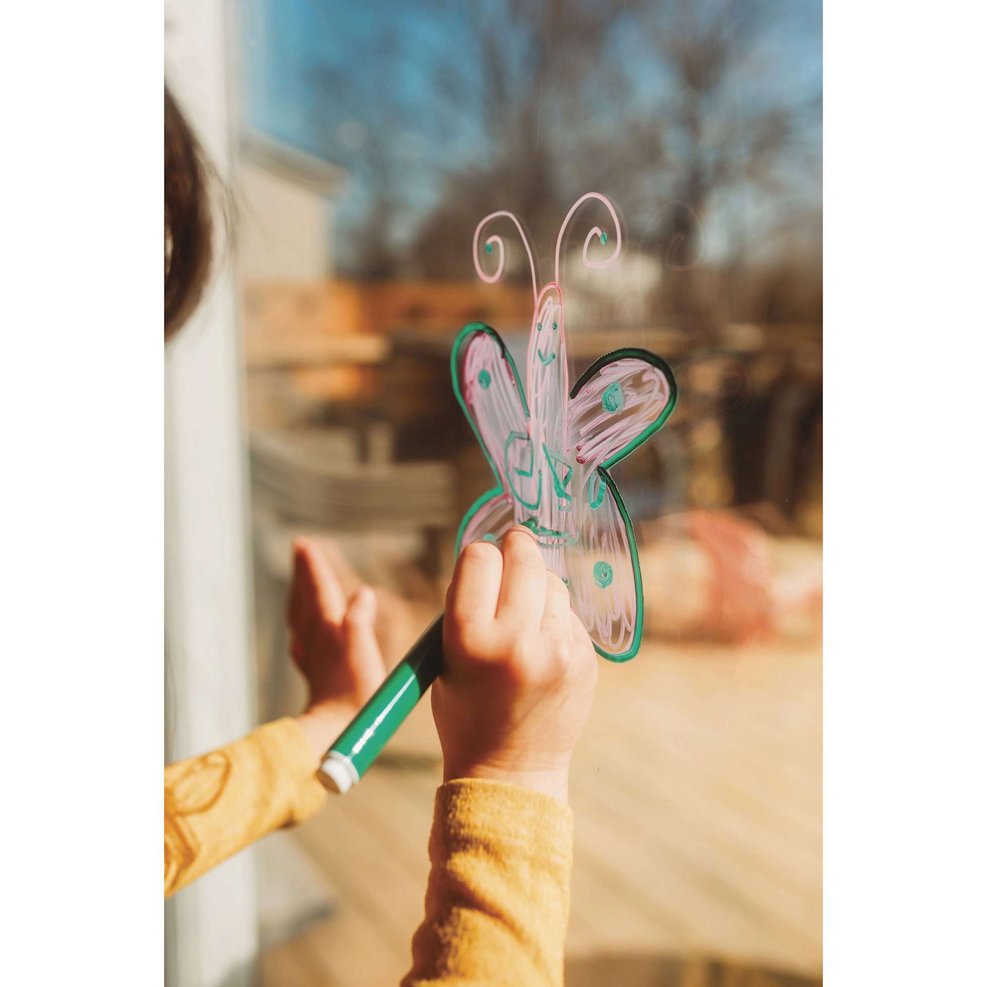 Magic Stix Triangular Washable Acrylic Marker, in hand drawing on glass