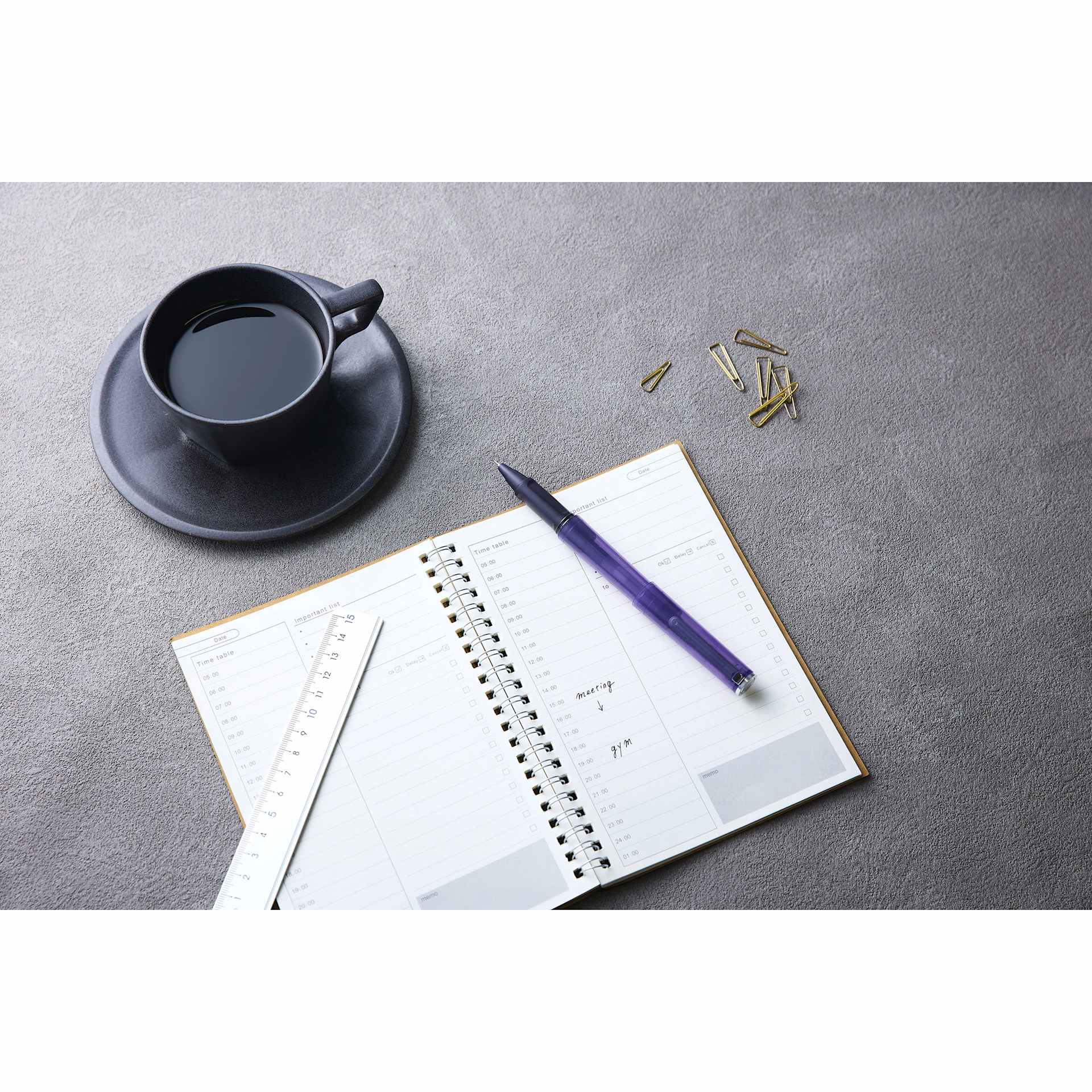 Sailor Tuzu Ballpoint Pen - Translucent Violet pen resting on planner