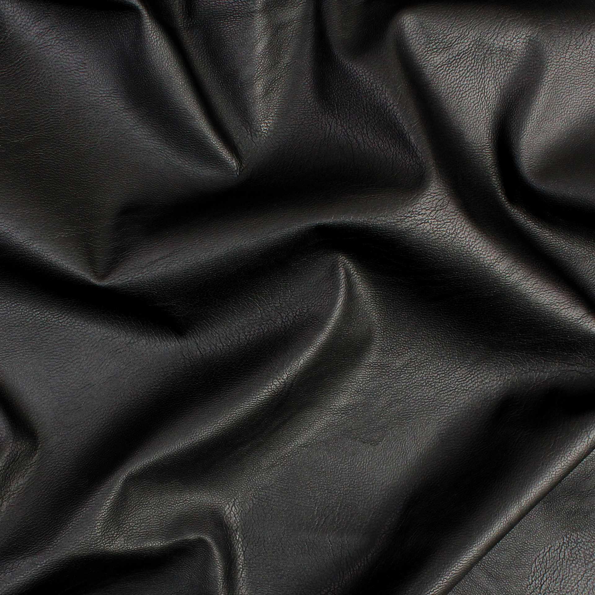 Camelot Solid Faux Leather - Black, 55" x 15 yds, wrinkled