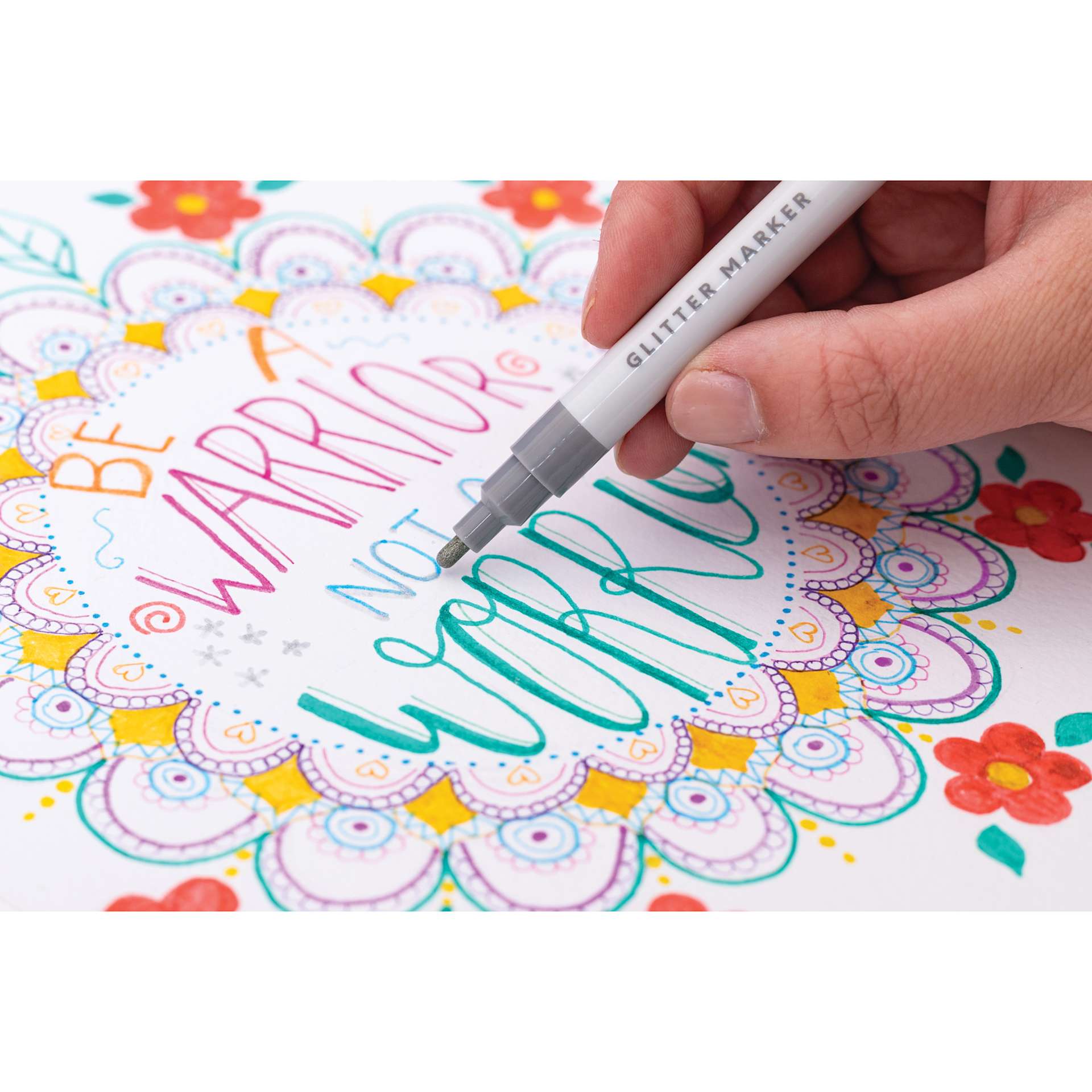Colorista Glitter Markers - Sparkling Brights, single marker in hand writing on paper