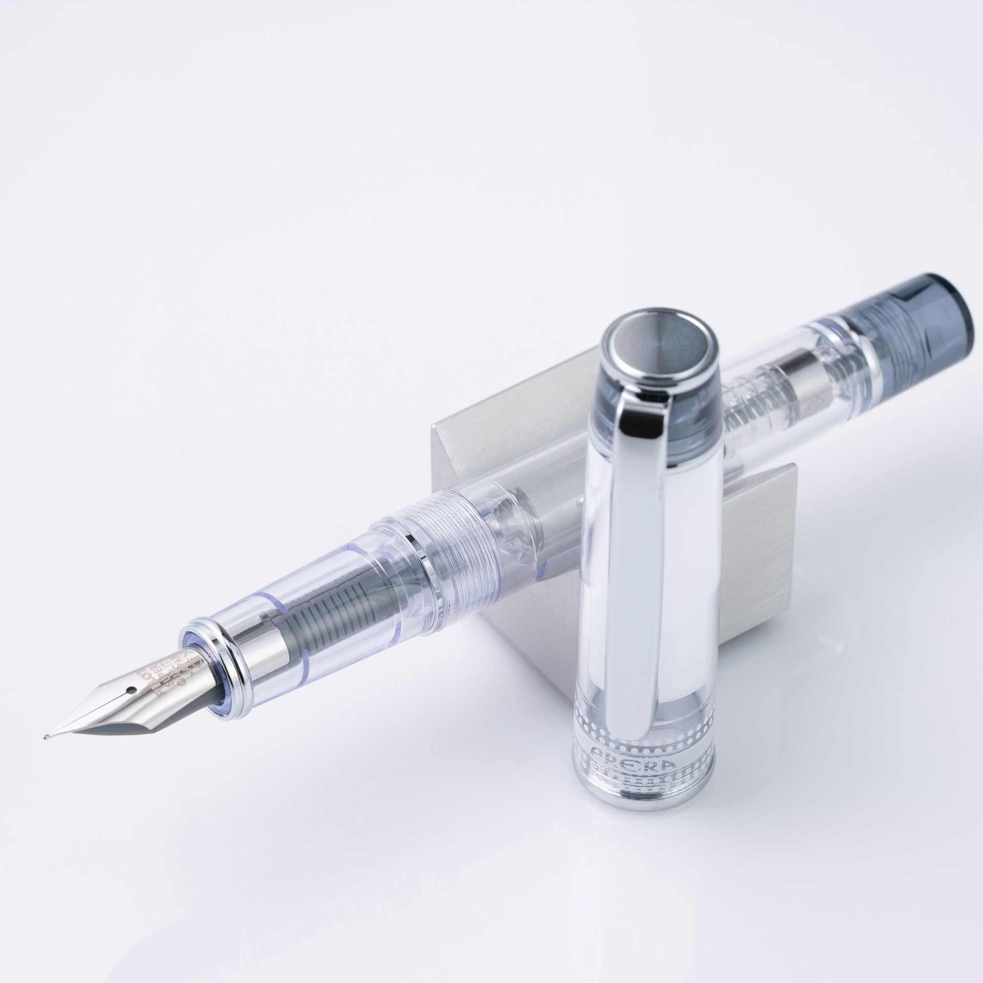 Pilot Prera Clear Fountain Pen - Black, Medium Nib, on stand (image may depict a different style nib)