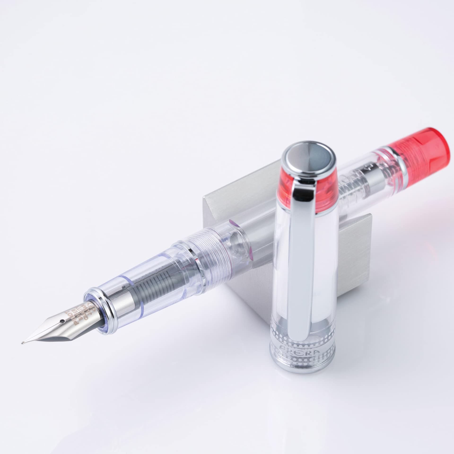 Pilot Prera Clear Fountain Pen - Red, Fine Nib, on stand (iamge may depict a different style nib)