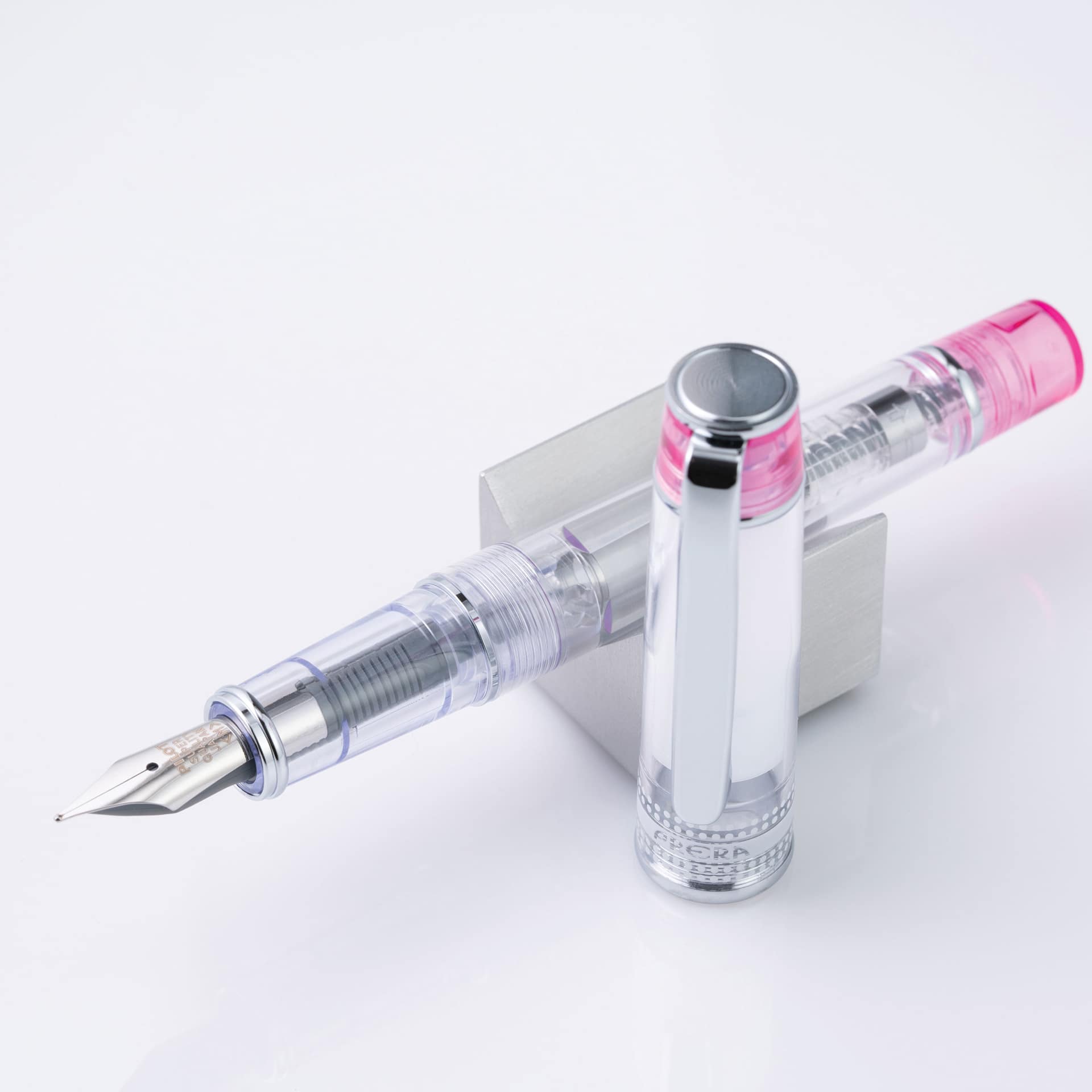 Pilot Prera Clear Fountain Pen - Pink, Medium Nib, on stand (image may depict a different size nib)