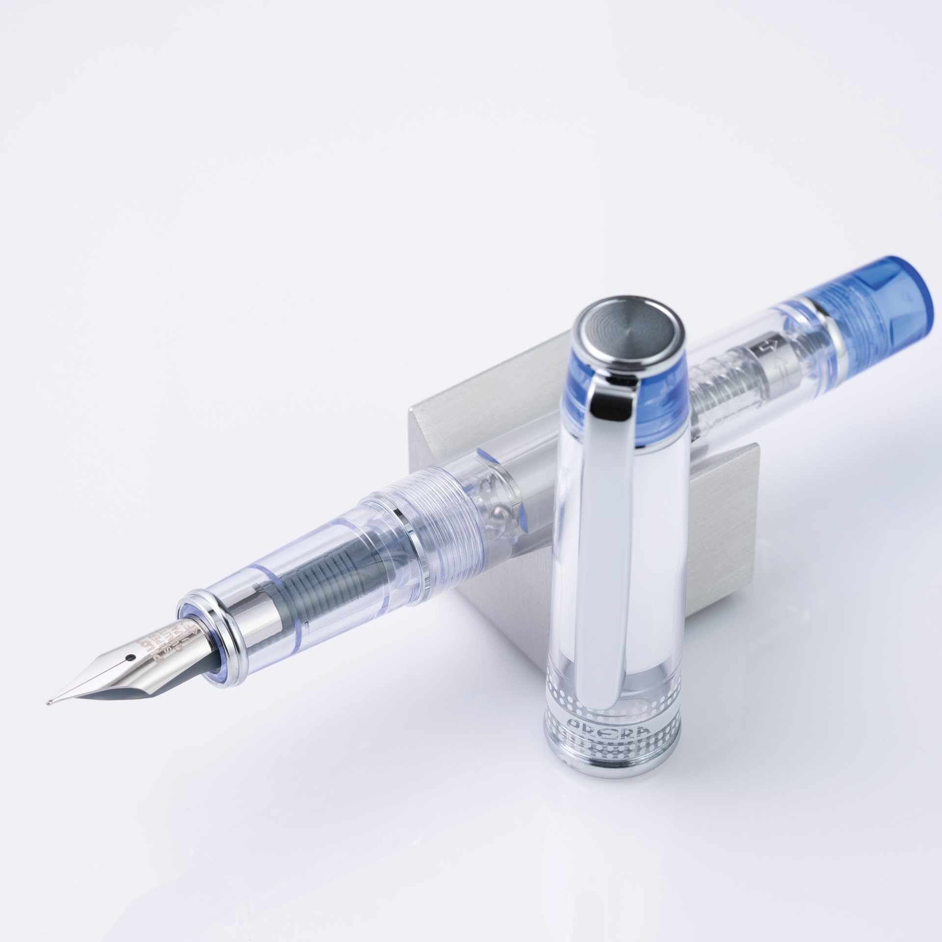 Pilot Prera Clear Fountain Pen - Blue, Medium Nib, on stand (image may depict a different style nib)
