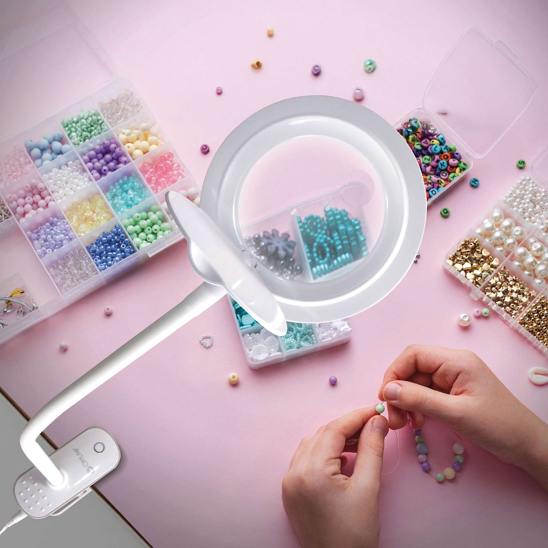 OttLite Lighted Magnifier Clip Lamp - in use with beads