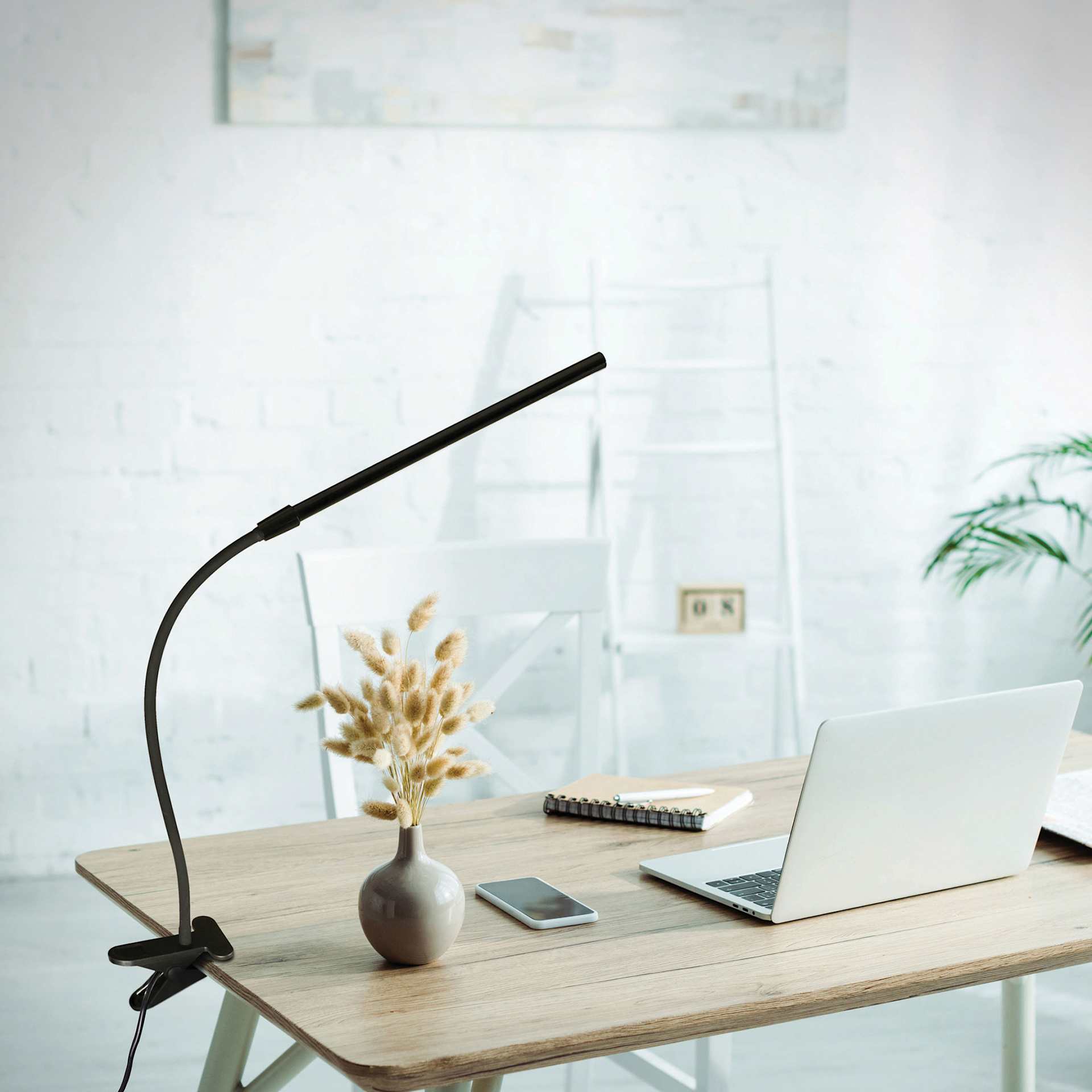 OttLite Clip-On LED Easel Lamp - Black, attached to a desk