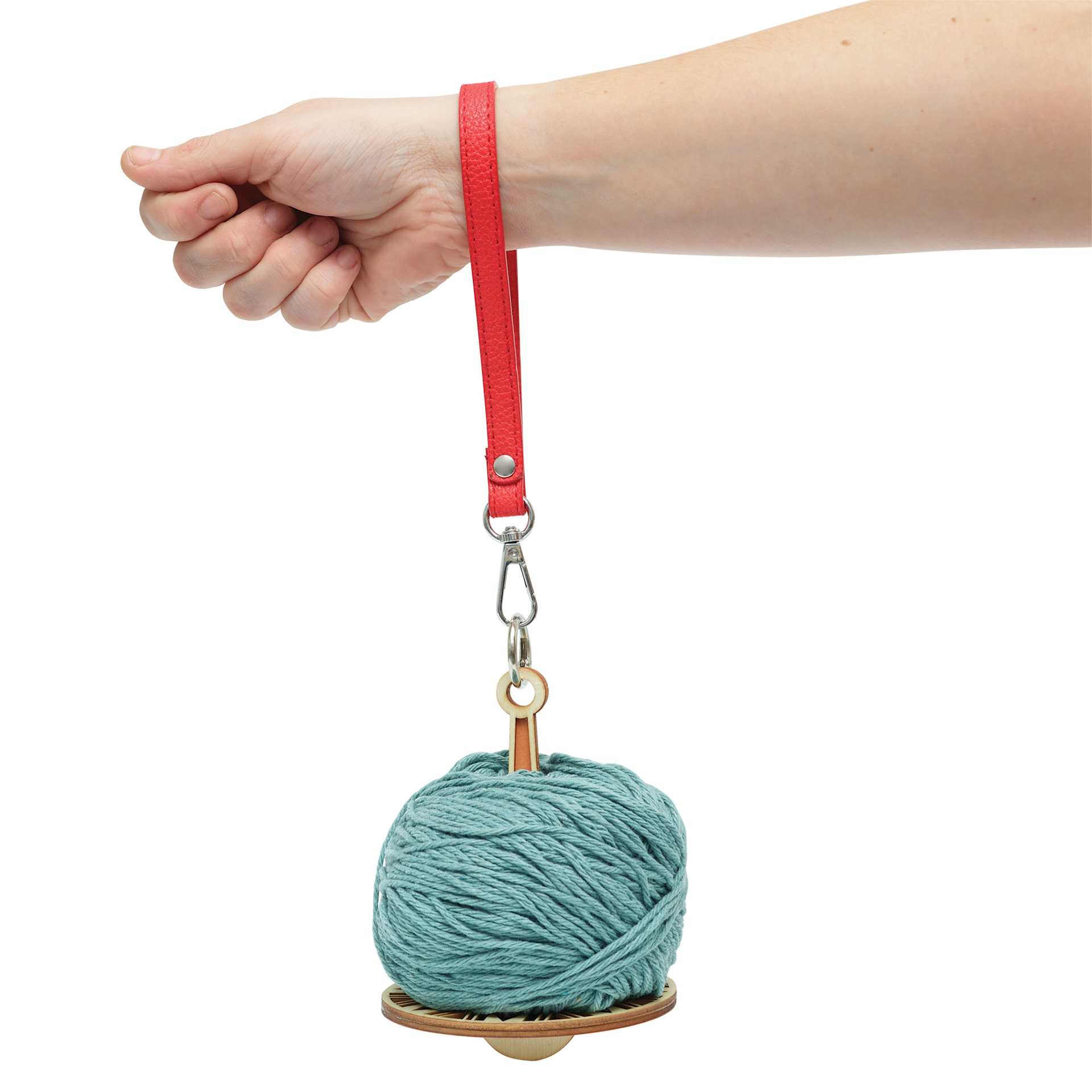 Hemptique Wrist Yarn Holder - Floral holding yarn while hanging from hand