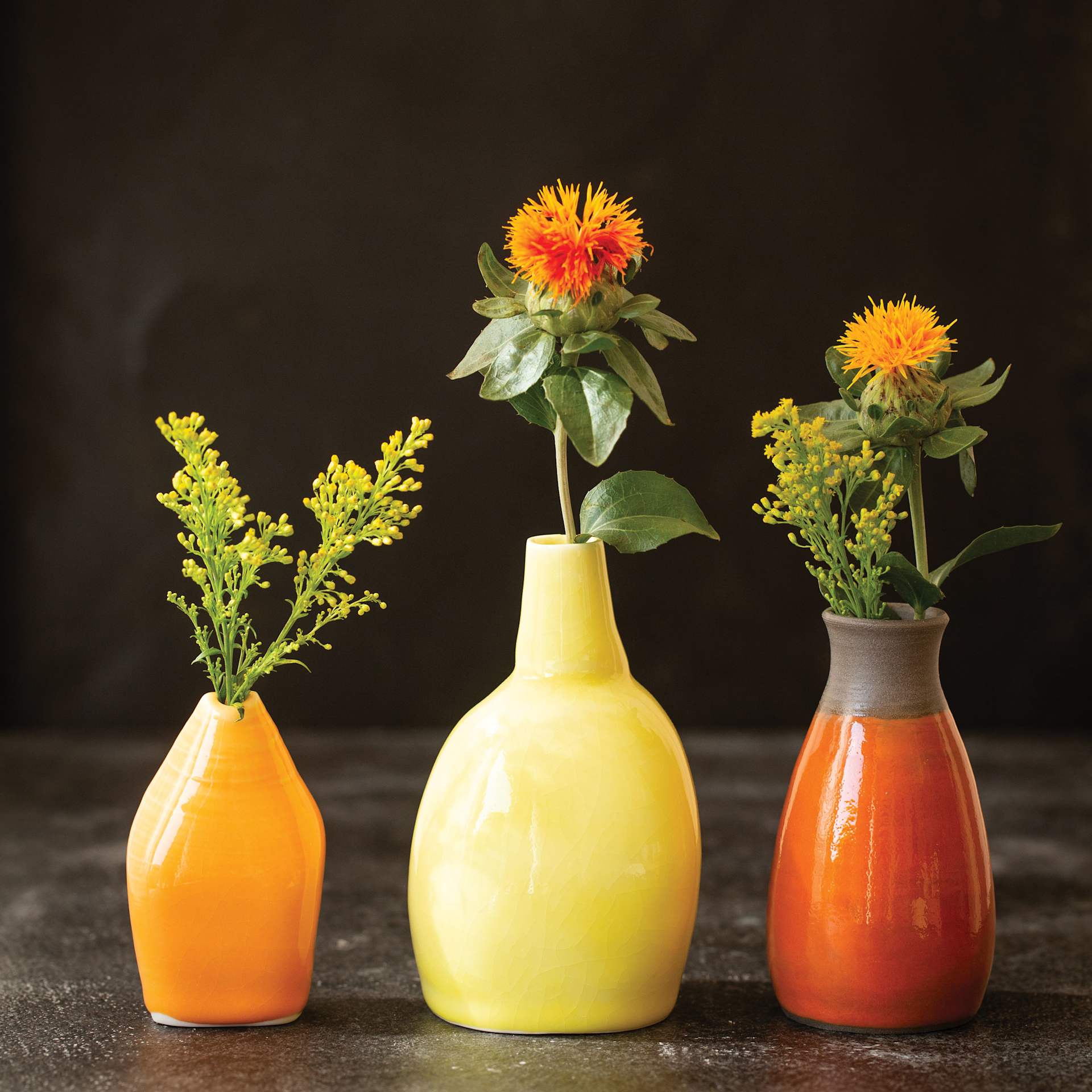 Botz Pro Glazes finished yellow and orange vase examples on table