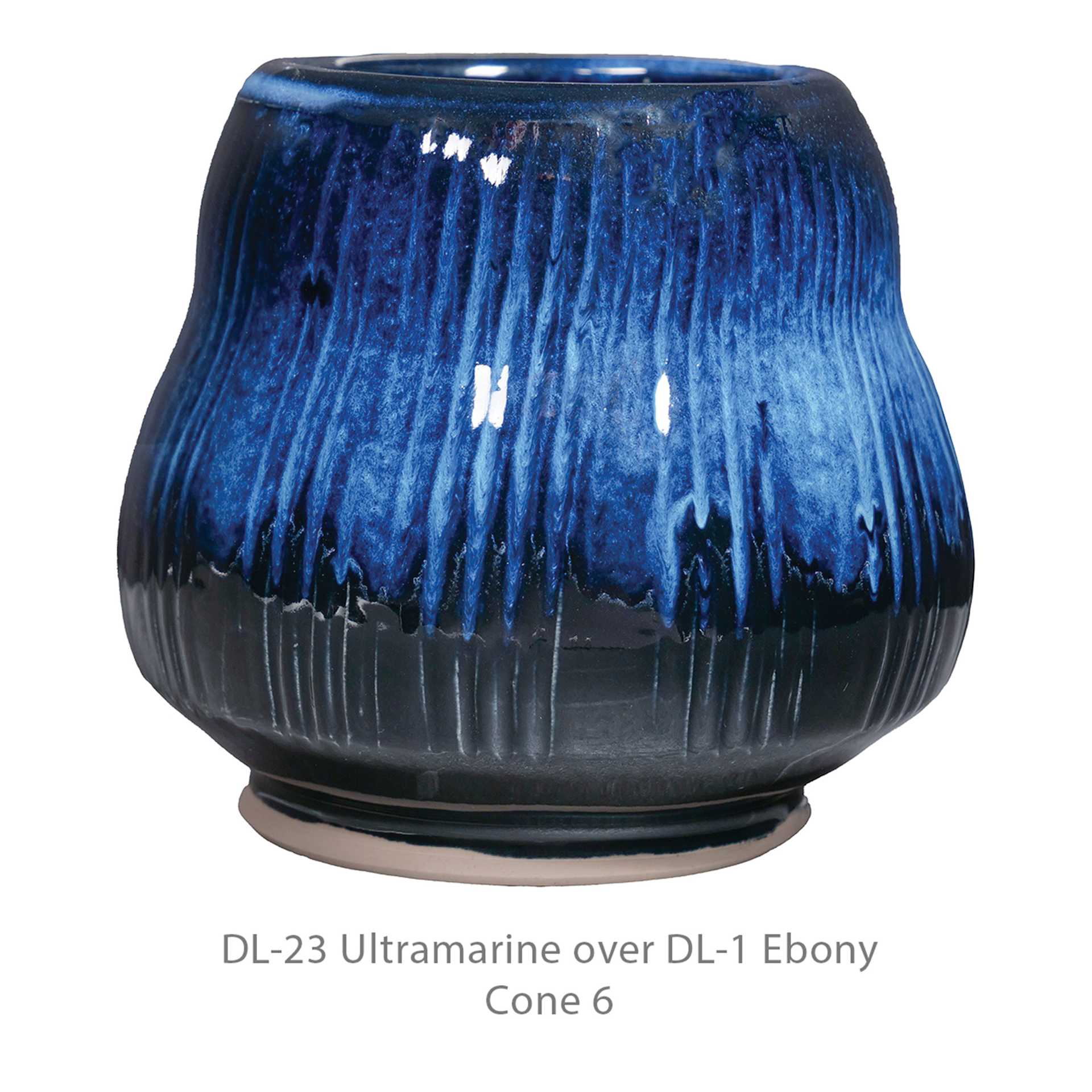 DL-23 Ultramarine over DL-1 Ebony. Cone 6.
