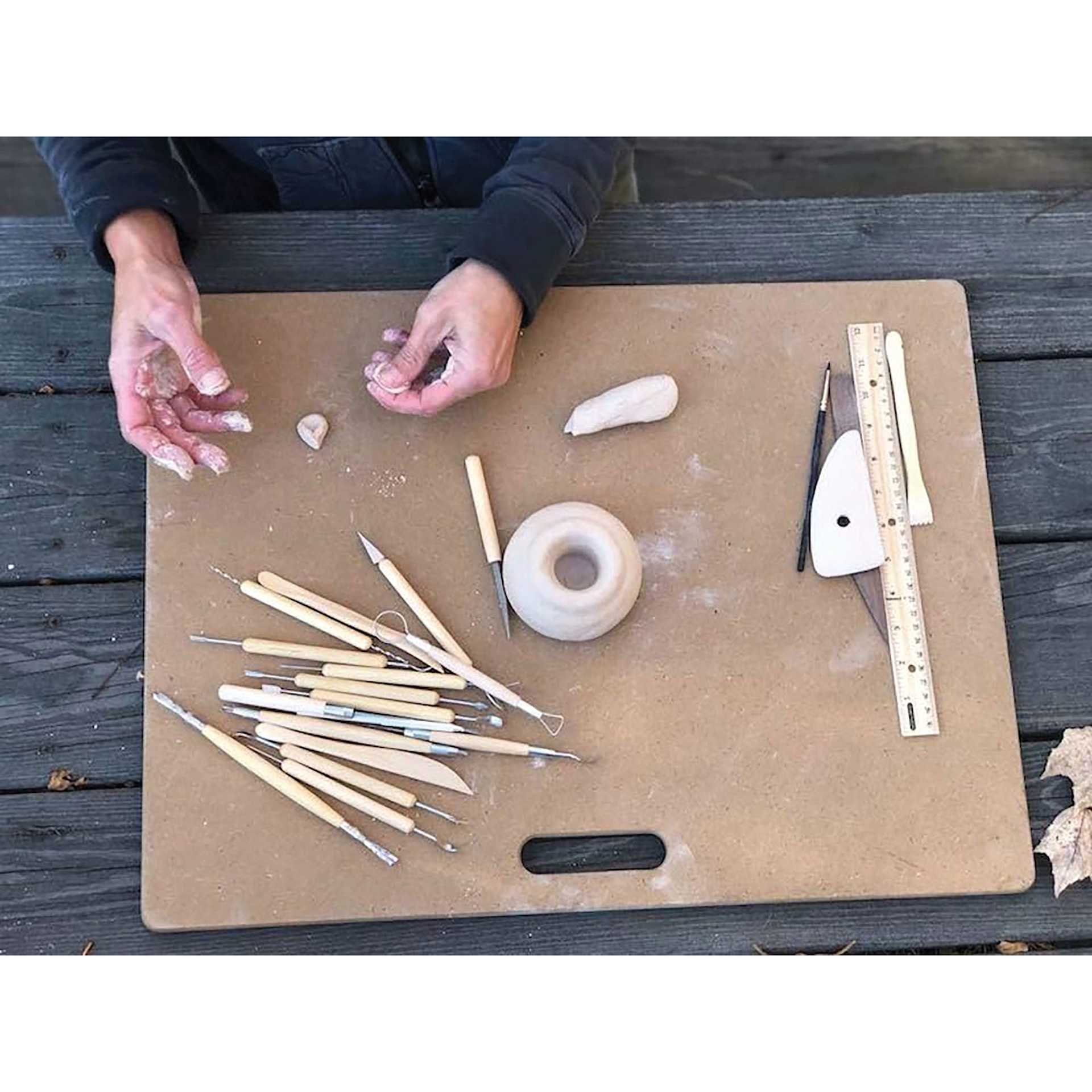 Penguin Pottery Portable Clay Wedging Board - 18" x 24", Large, Single Handle in use