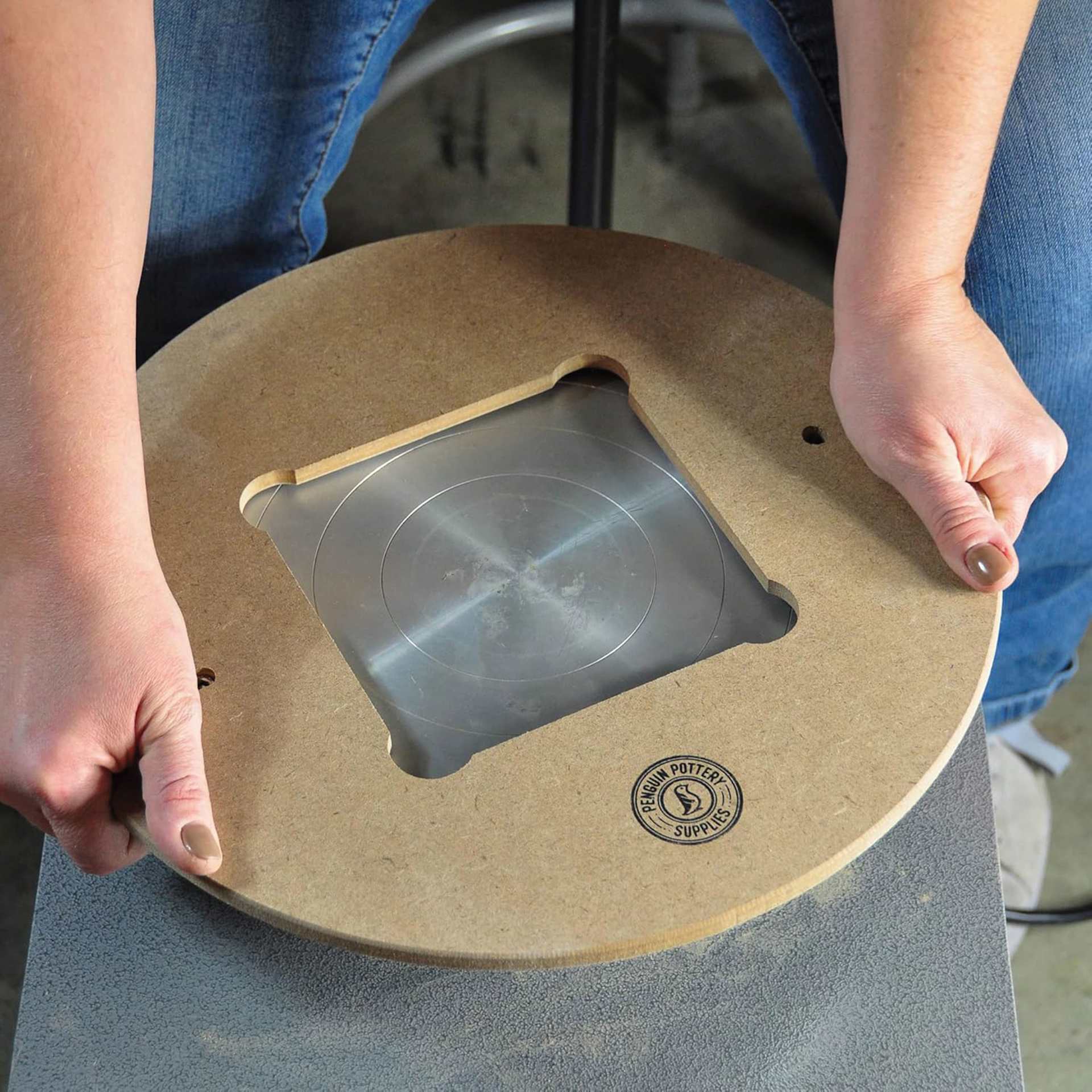 Penguin Pottery Heavy-Duty Bat System - 14" Base, 5 Inserts bat base being placed