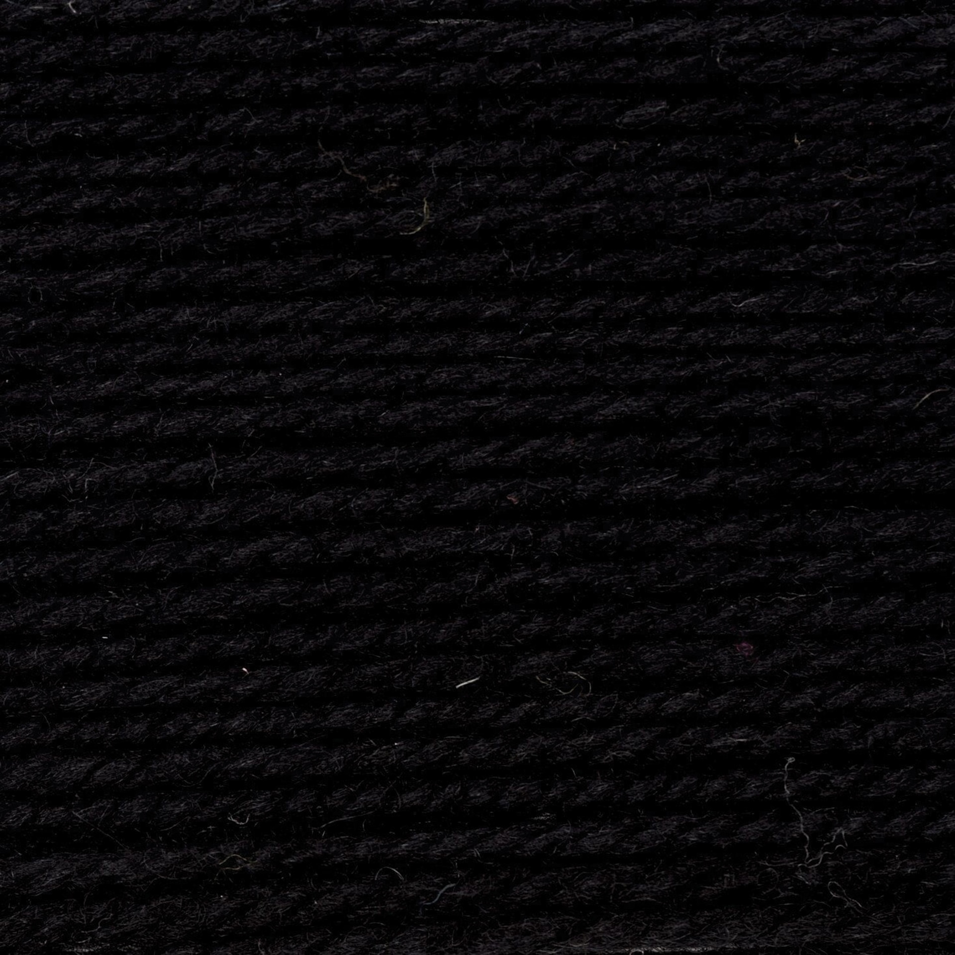 Rico Design Essentials Soft Merino Aran Yarn - Black, 109 yds close up to show texture
