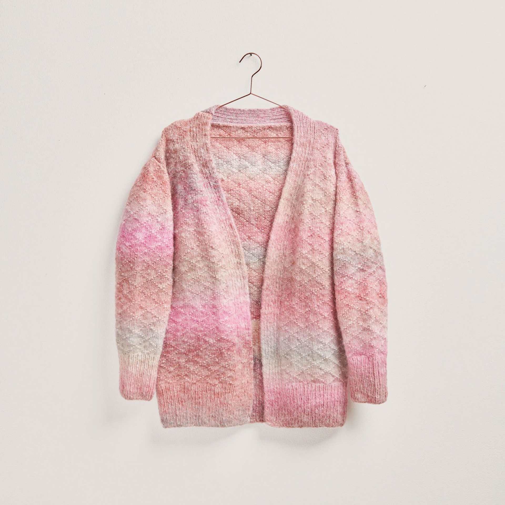 Rico Design Creative Painted Power Yarn - Roses, 340 yds showing complete cardigan project