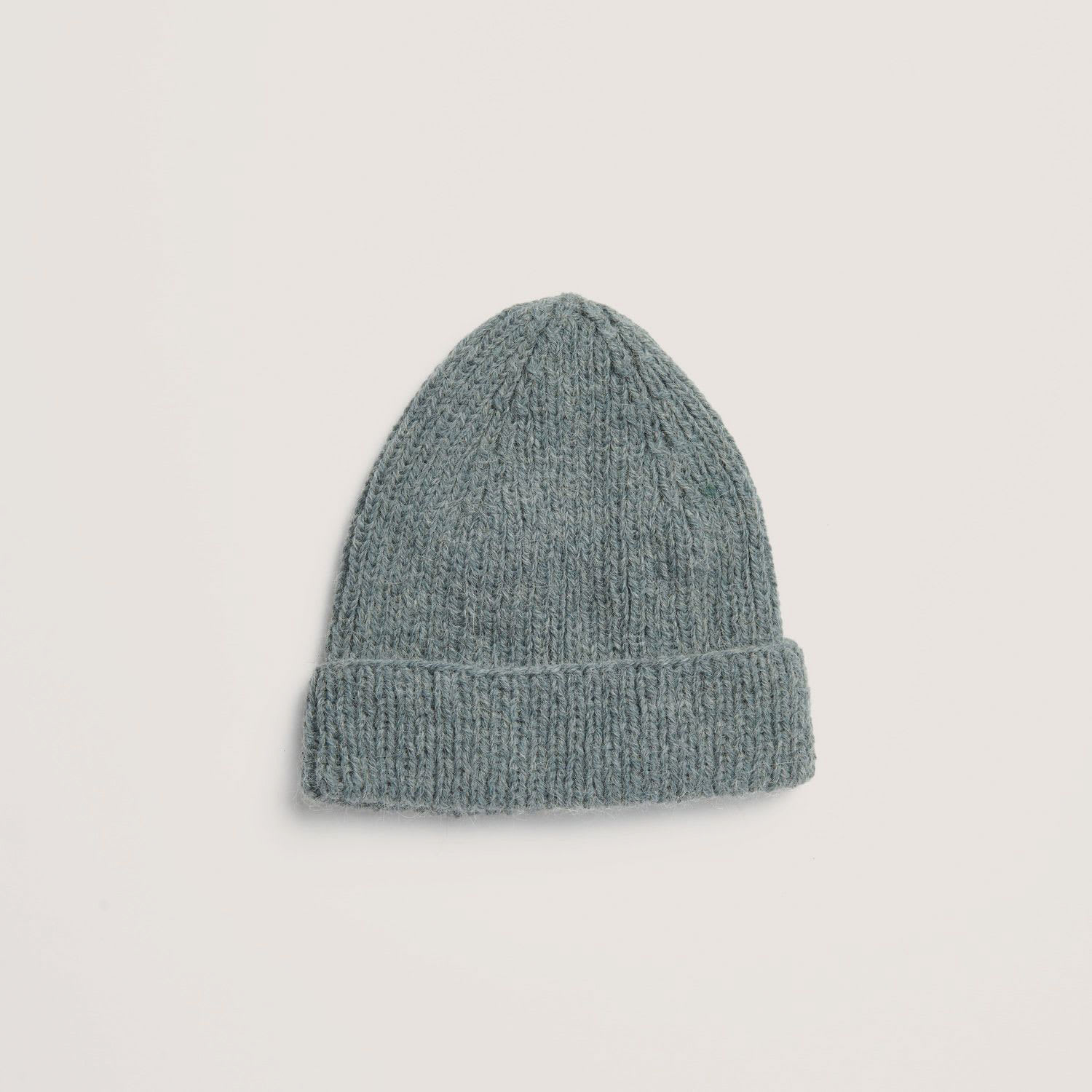 Rico Design Soft Alpaca Yarn - Blue, 137 yds showing completed hat project