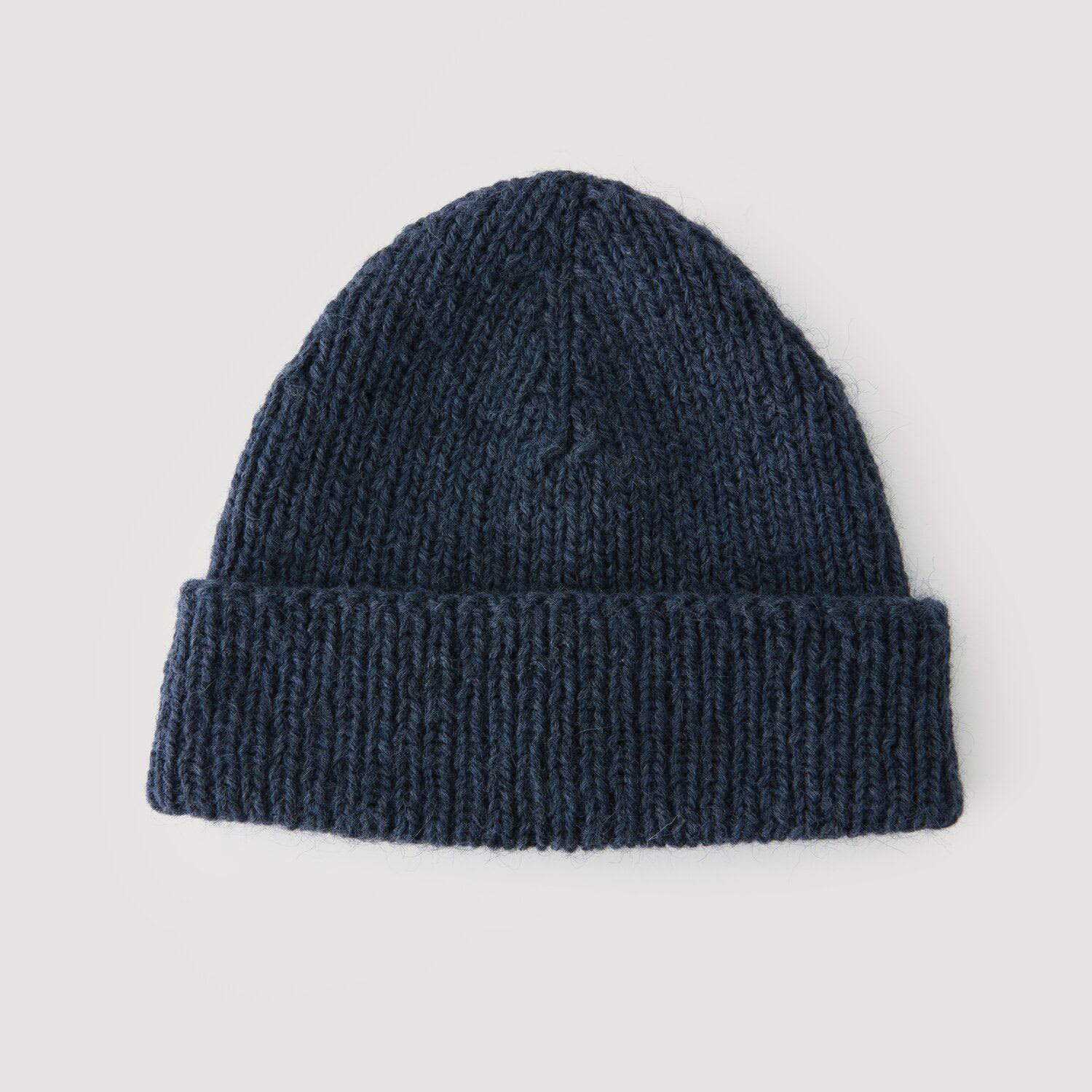 Rico Design Soft Alpaca Yarn - Navy Blue, 137 yds showing completed hat project