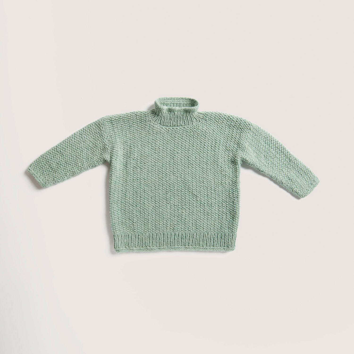 Rico Design Soft Alpaca Yarn - Aqua, 137 yds showing completed sweater project