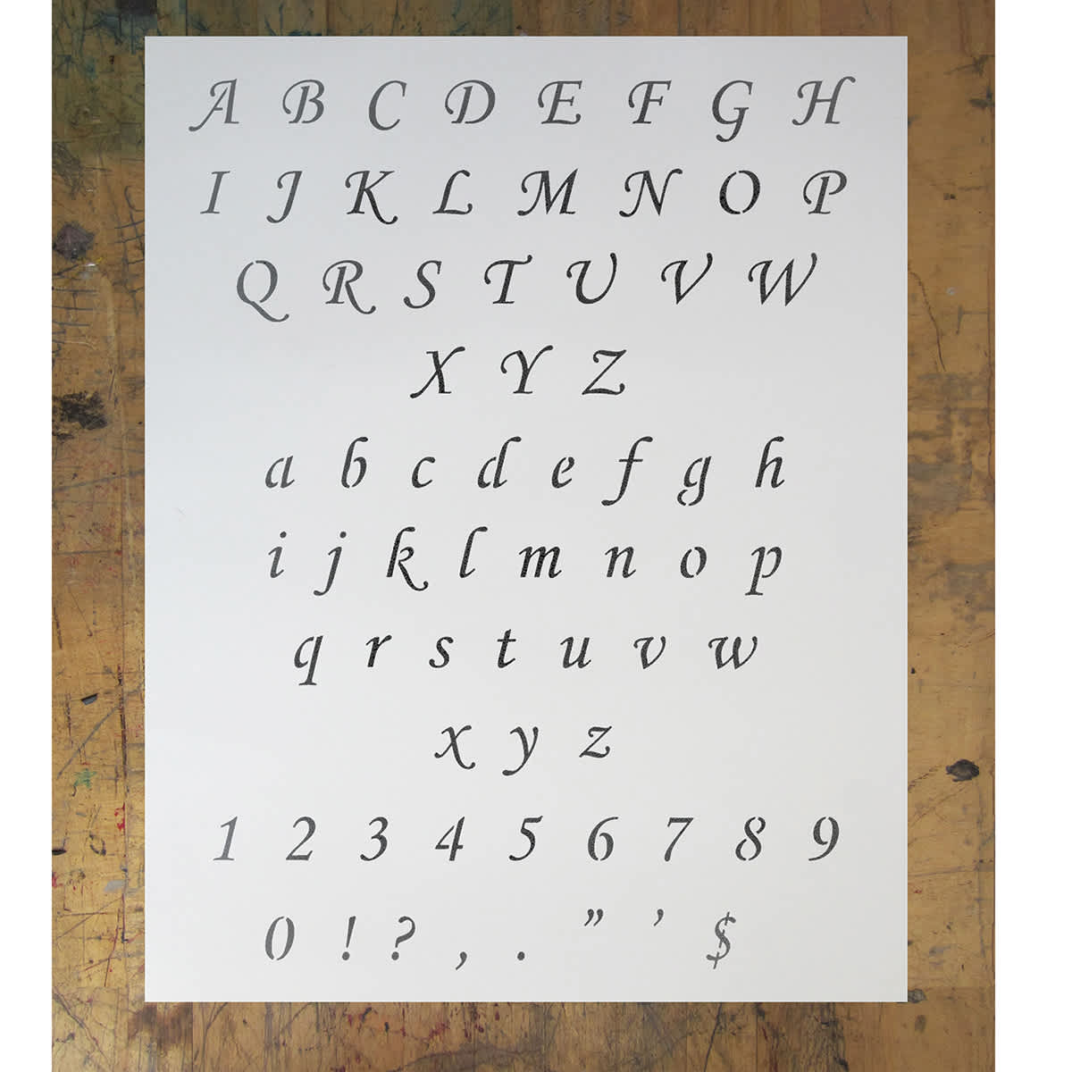 Stencil1 Font Stencil - Corsiva, 1/2" Letters (Sample Letters)