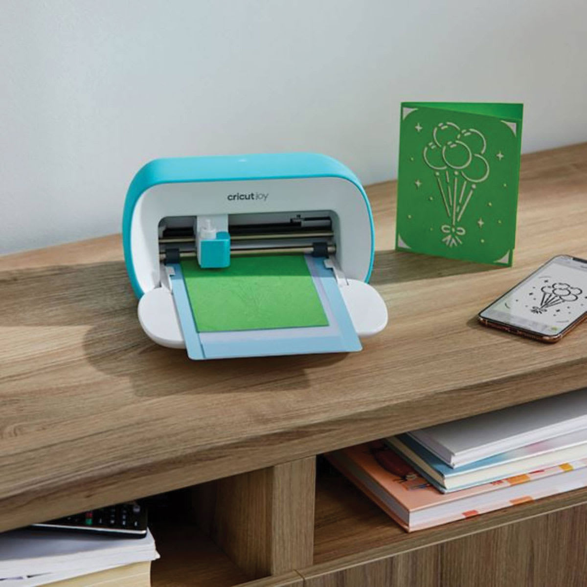 Cricut Joy (Shown cutting material)
