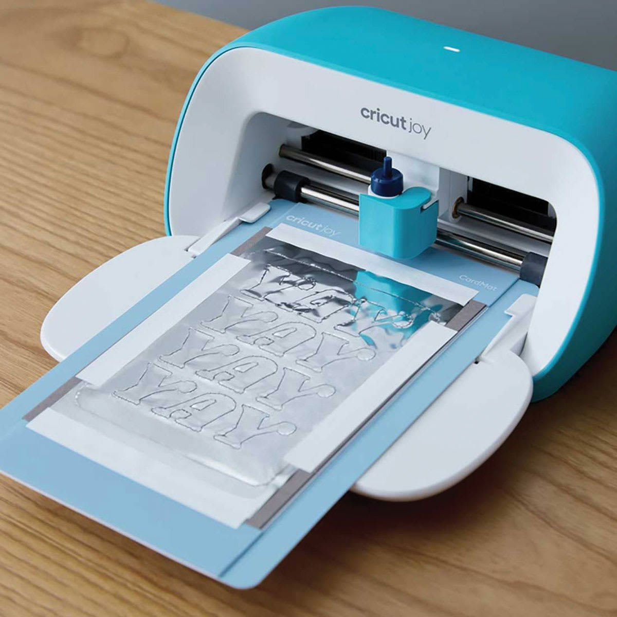 Cricut Joy Foil Transfer Kit (Cricut Joy machine adding foil to project with Cricut Joy Foil Transfer Tool Housing and silver foil)