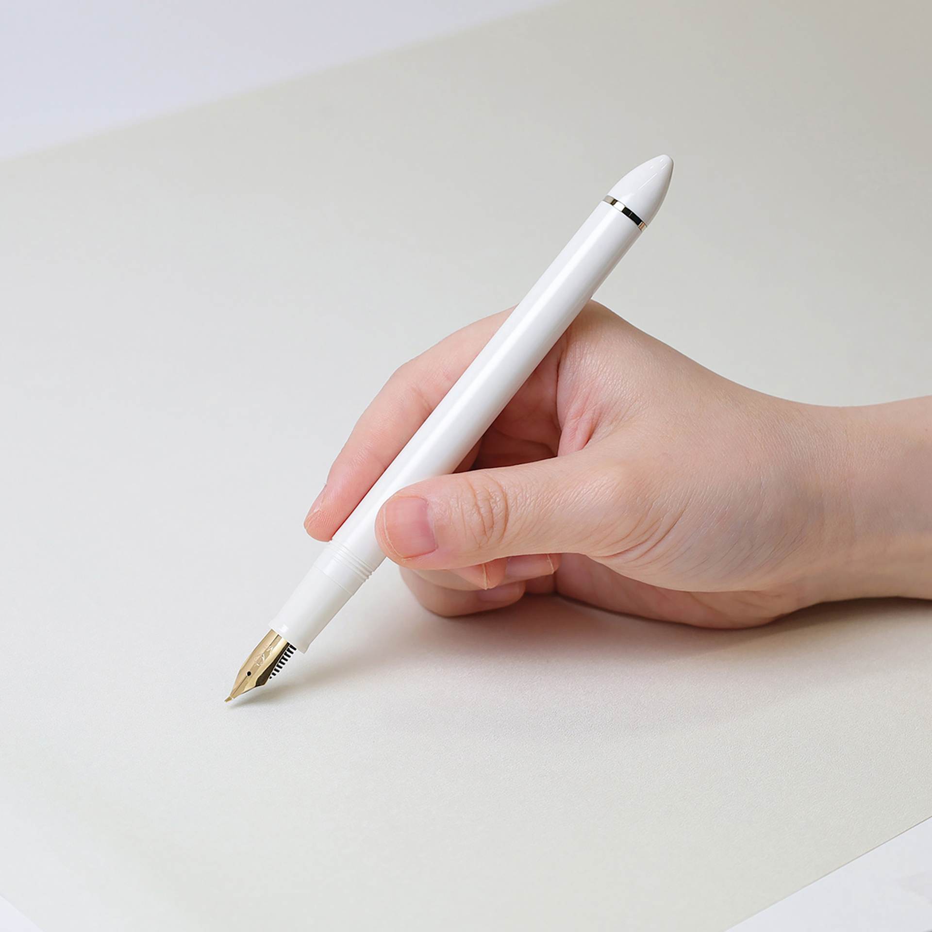 Sailor Fude De Mannen Fountain Pen - Pearl White, 40 Degree Nib, in hand
