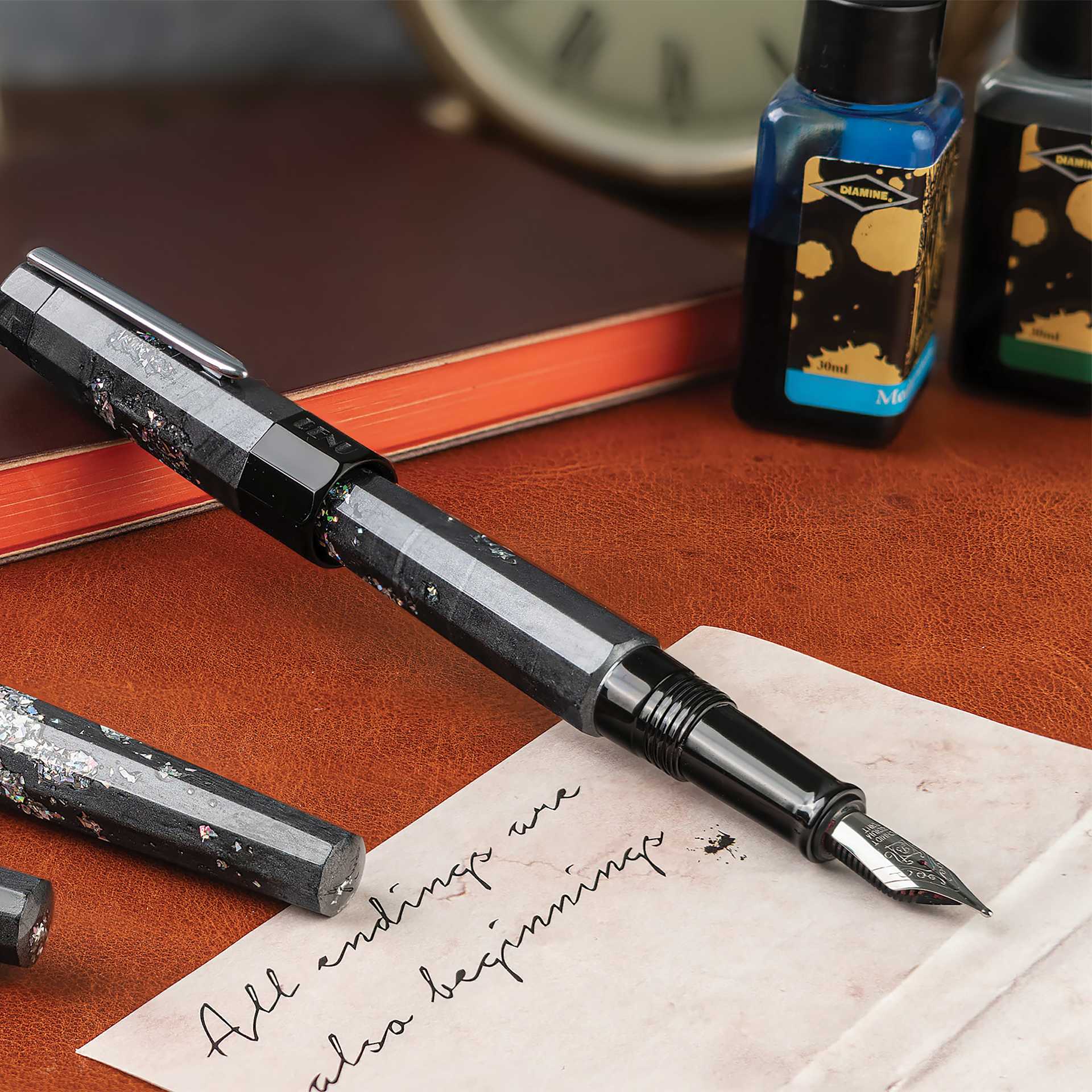 Benu Euphoria Fountain Pen - Caviar, pen laid out with cap off (image shows a different size nib)