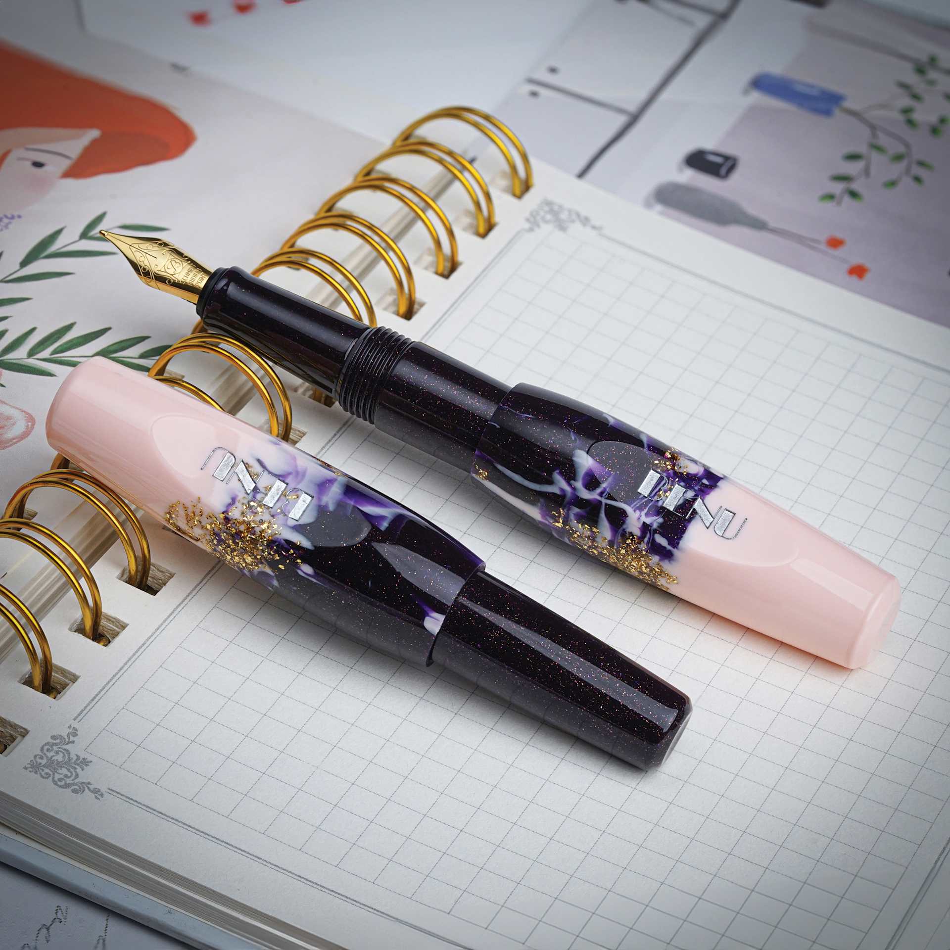 Benu Pixie Fountain Pen - Plum Cream, pen laid out (image may show a different size nib)