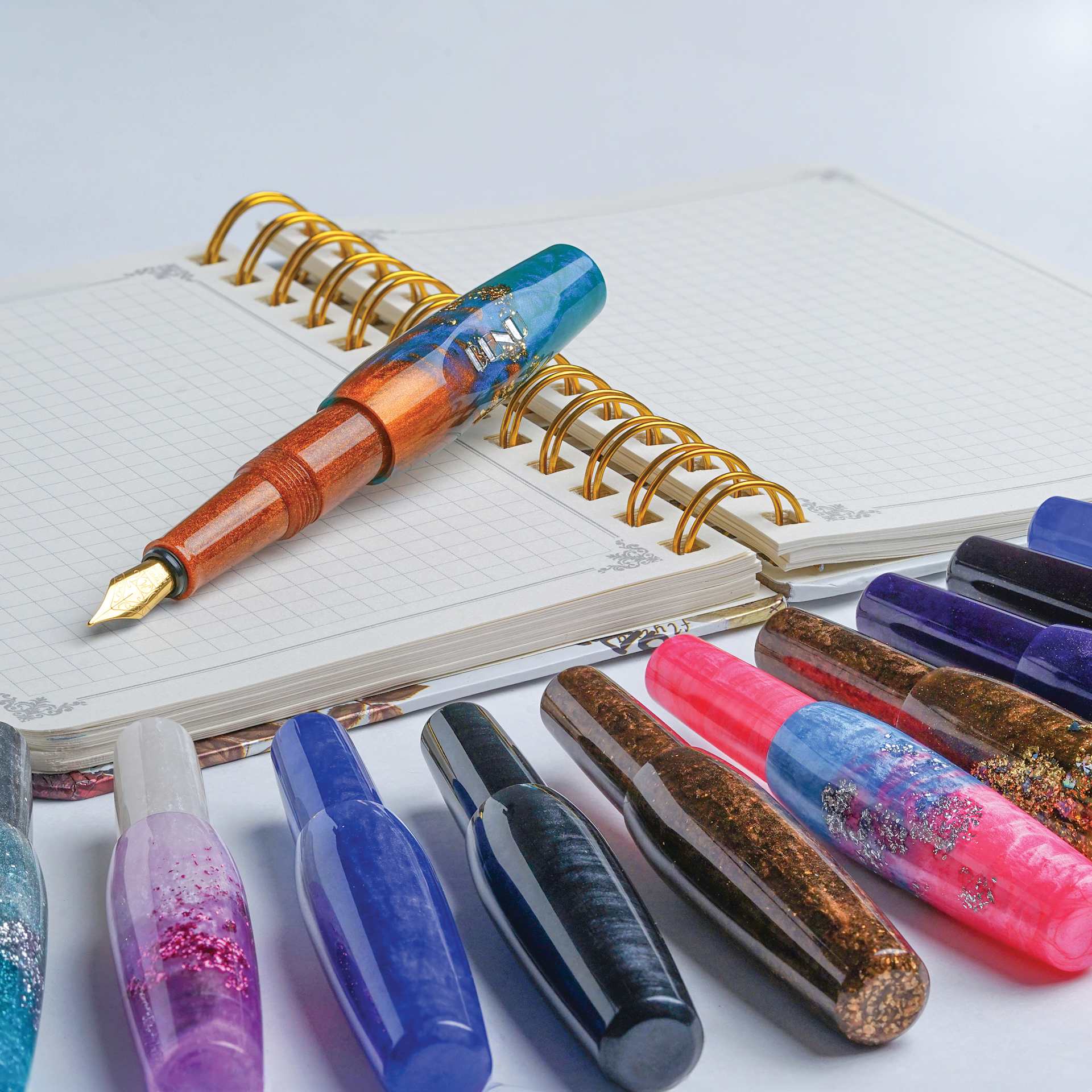 Benu Pixie Fountain Pens, one pen laid out on pad (not included)