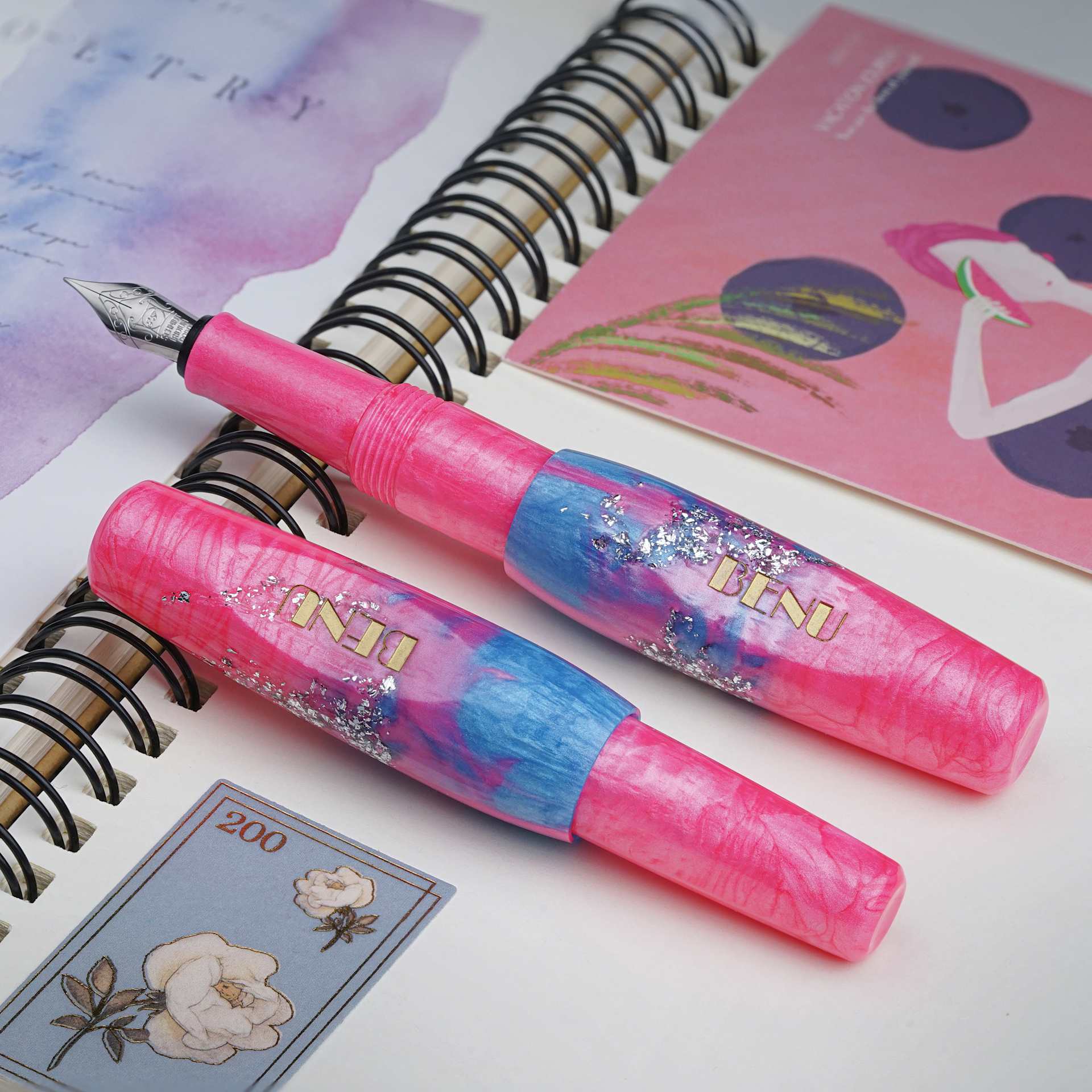 Benu Pixie Fountain Pen - Stardust Pink, pen laid out (image may show a different size nib)