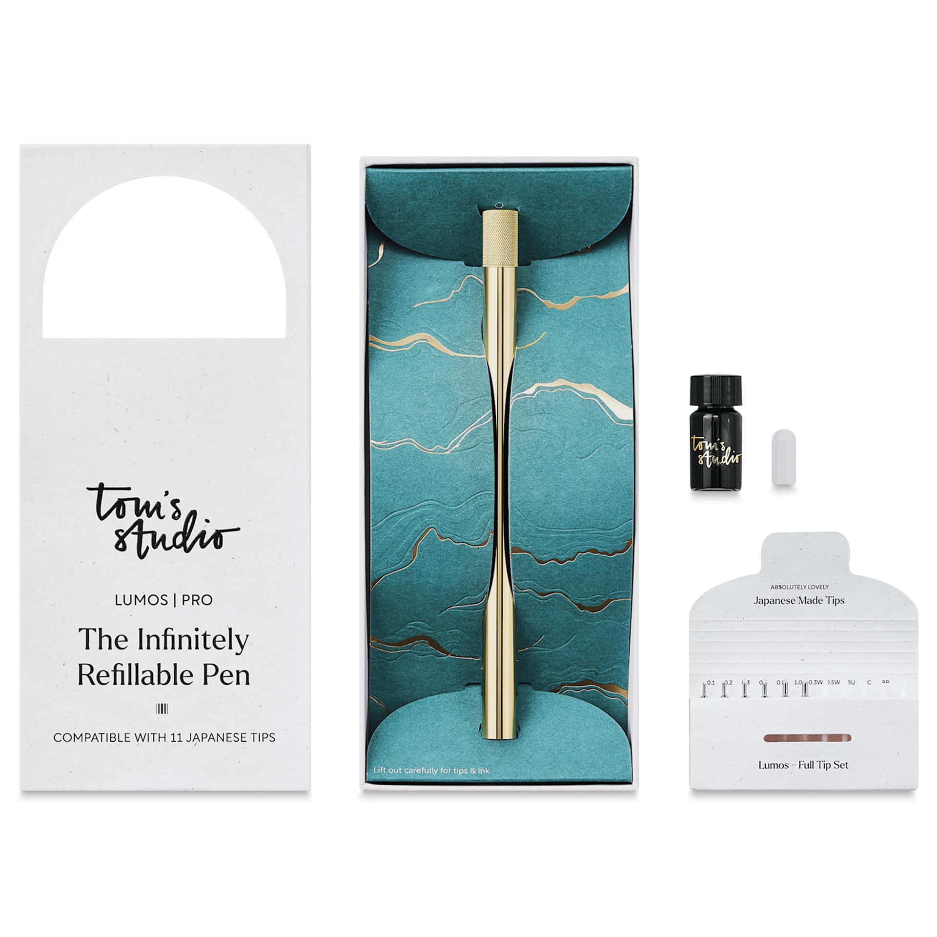 Tom's Studio Lumos Pro Refillable Single Tip Pen - Brass, pen in packaging and contents laid out