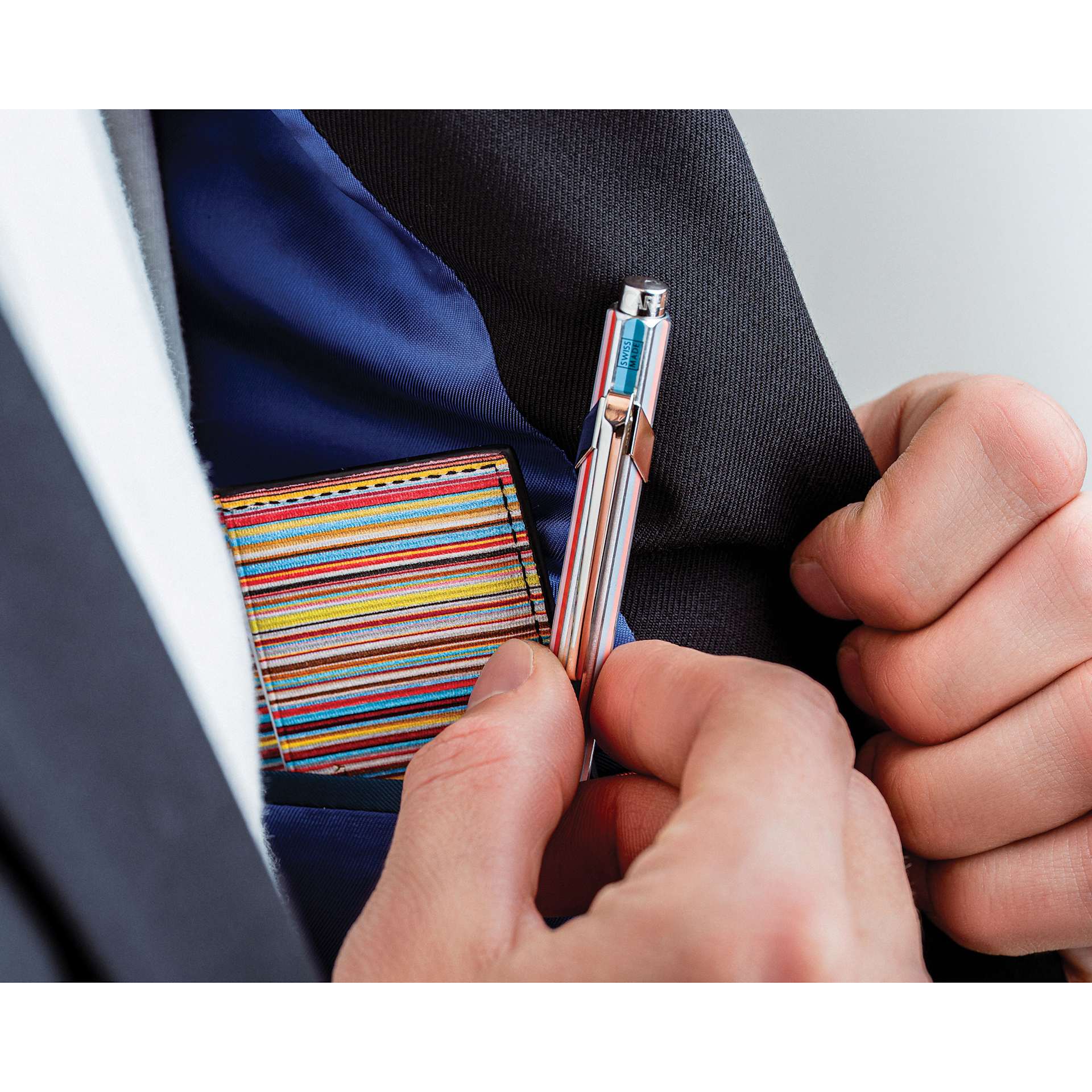 Caran d'Ache Special Edition No. 5 Paul Smith 849 Ballpoint Pen - Silver, placed in pocket