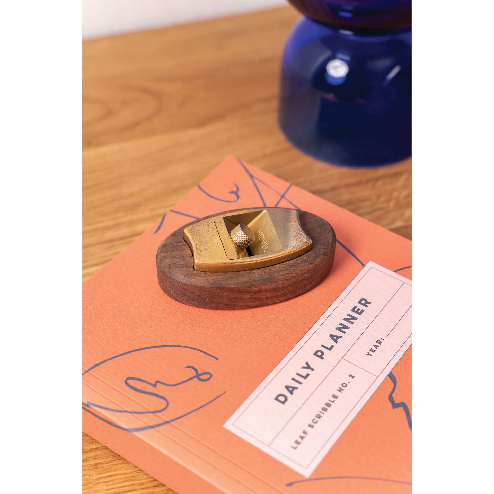 Makers Cabinet Hovel Walnut Base - 1/2" x 3" x 1-3/4", on desk