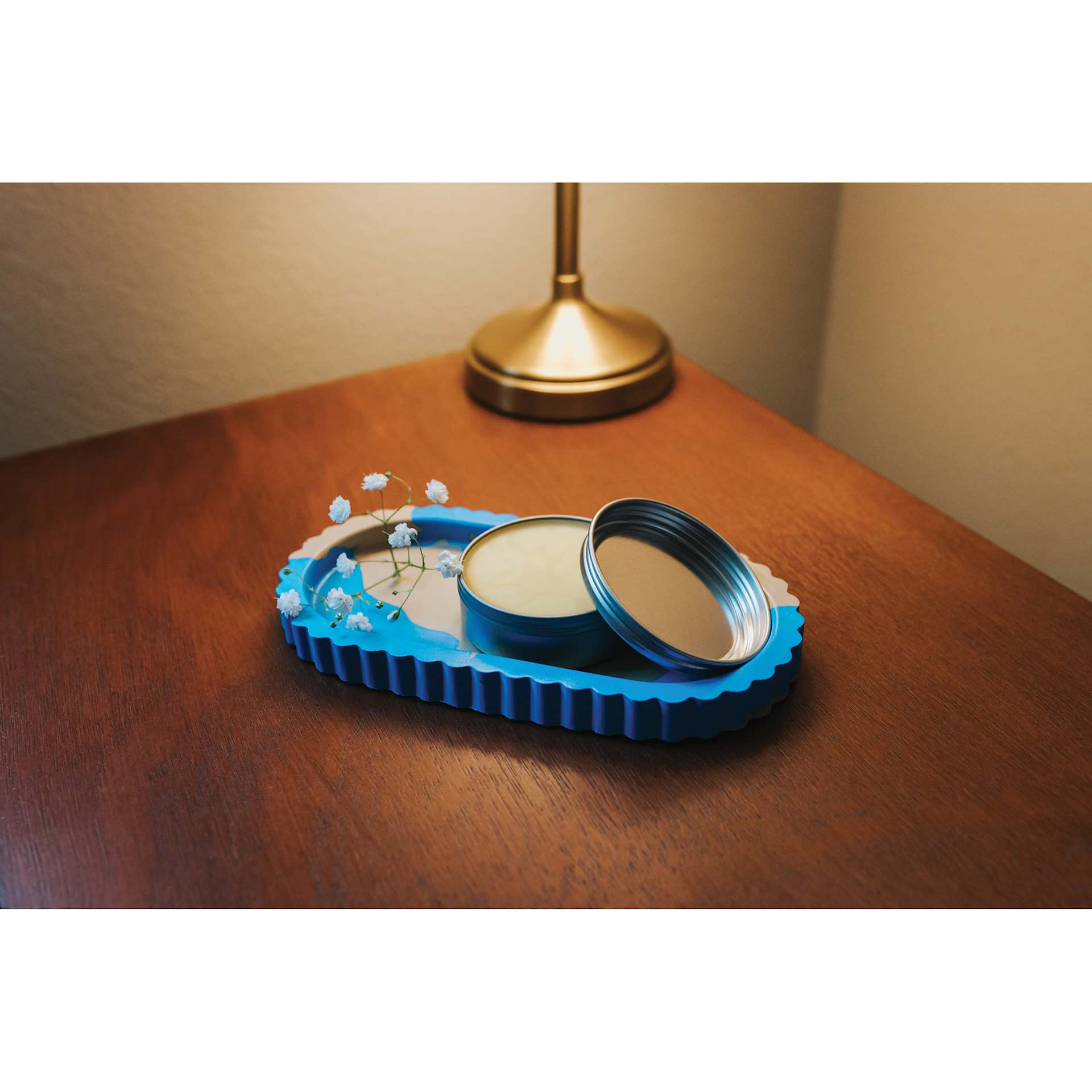 Jesmonite Silicone Tray Mold - Oval Fluted Tray completed project holding can of balm
