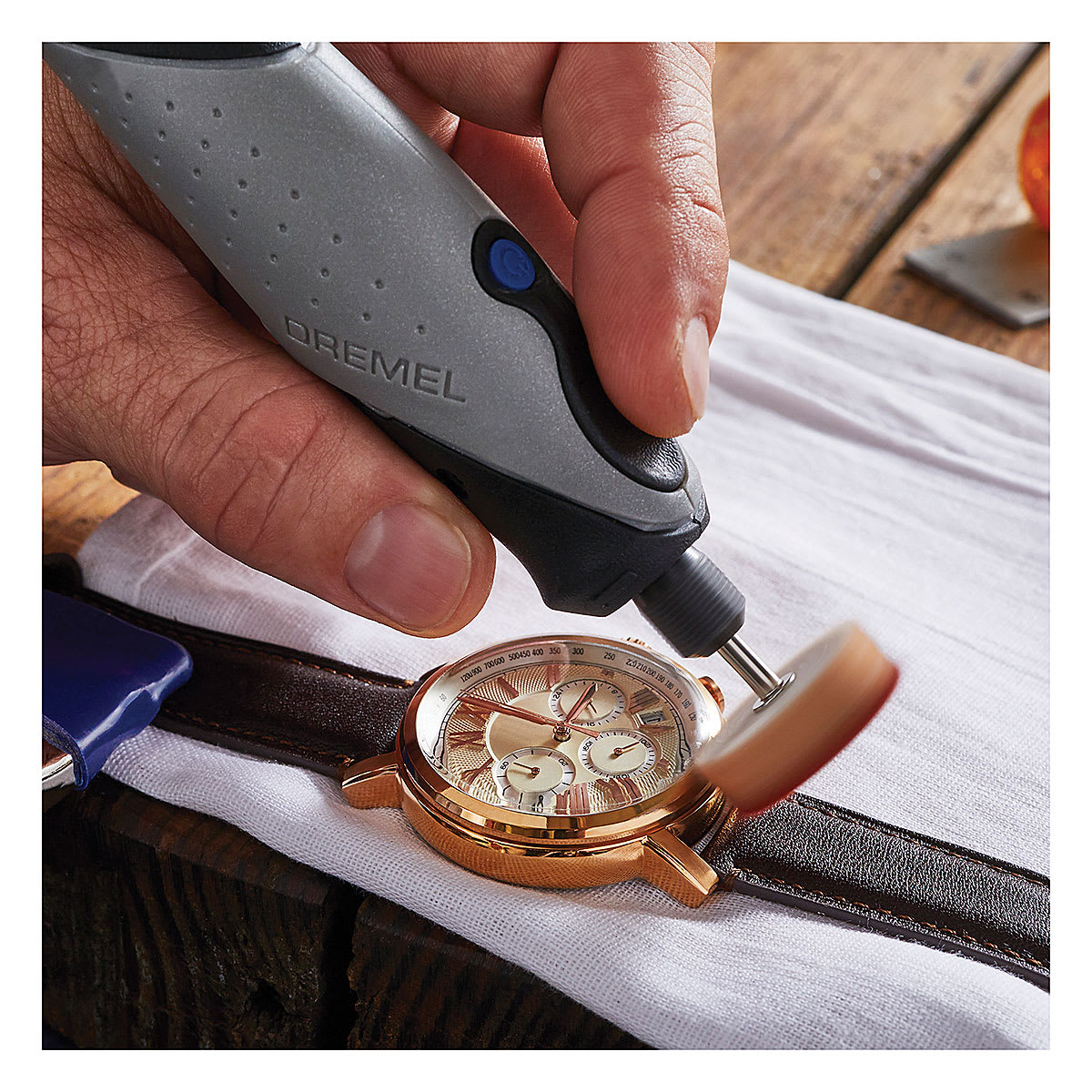 Dremel General Purpose Accessory Kit - Closeup of tool polishing Watch bezel