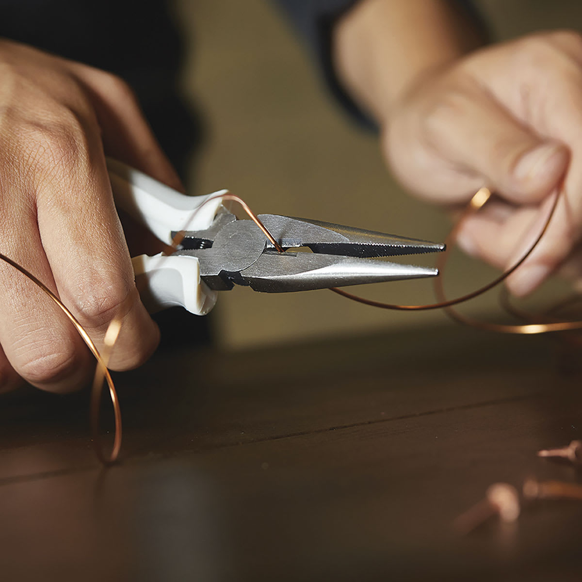 Fiskars Precision Needle-Nose Pliers - Photo showing hands bending wire with Pliers
