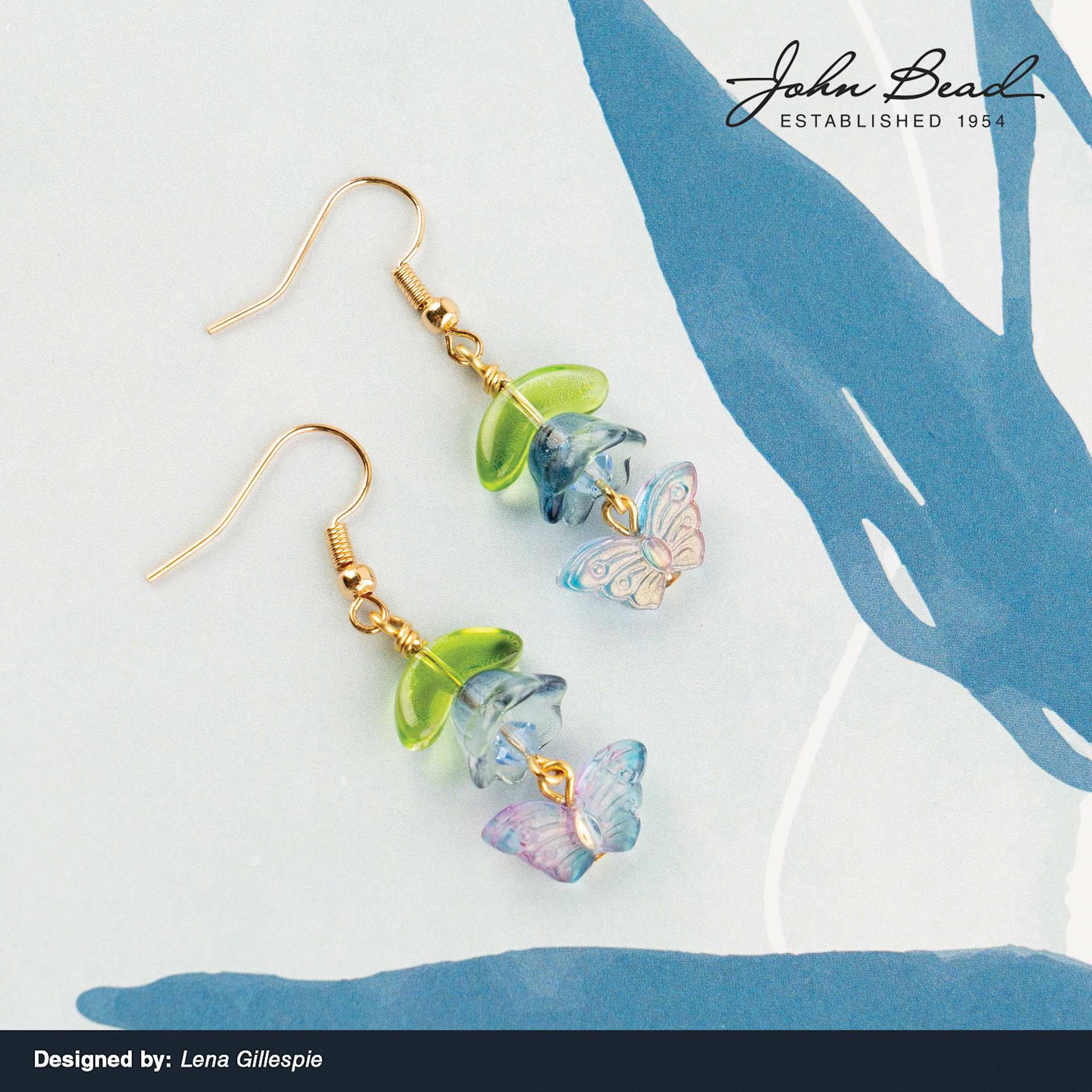Tulip and Butterfly beads from the John Bead Crystal Lane DIY Glass Garden Bead Strand used to create earrings.