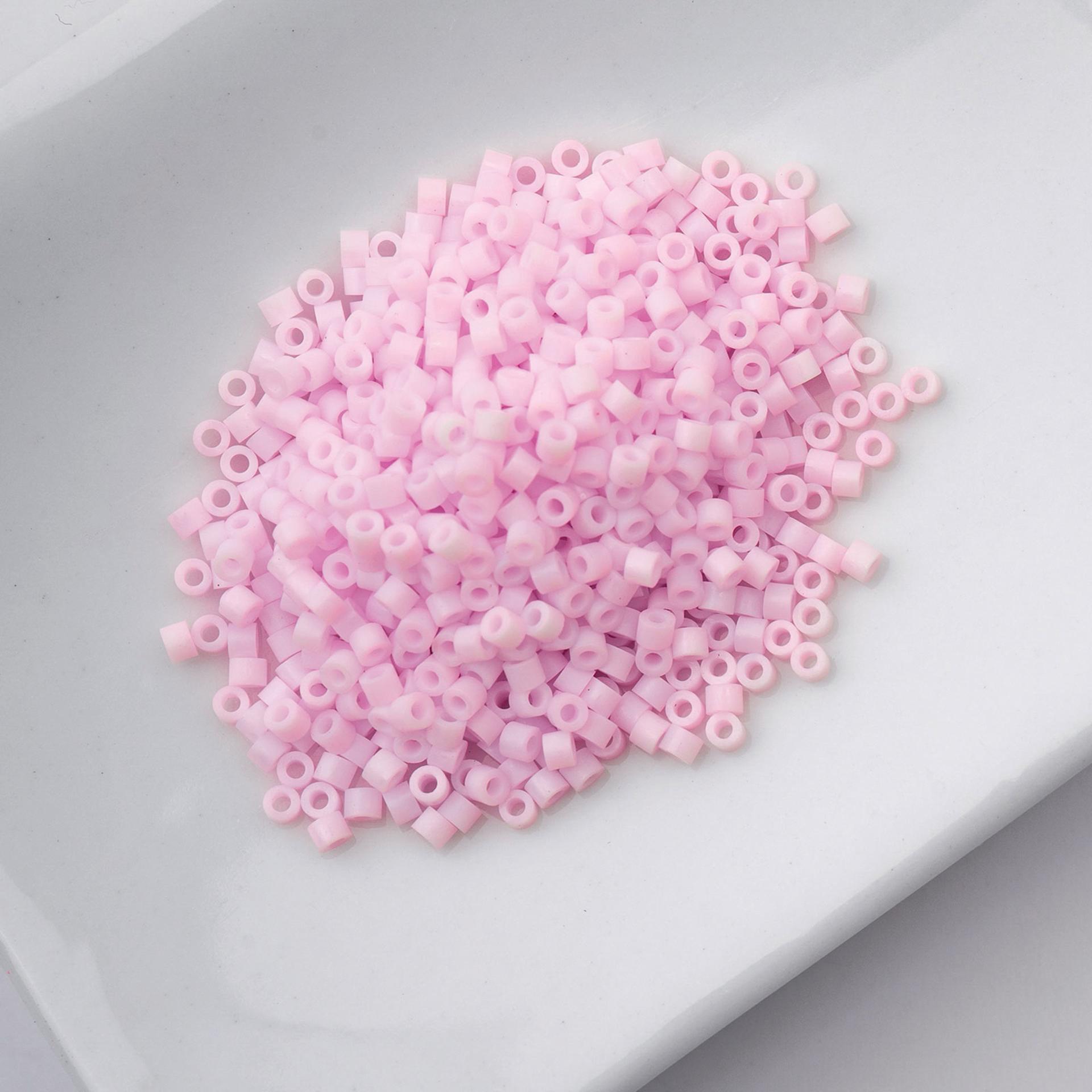 John Bead Cylin 11/0 Matte Macaron Cylindrical Seed Beads - Pink Cotton Candy sitting in dish